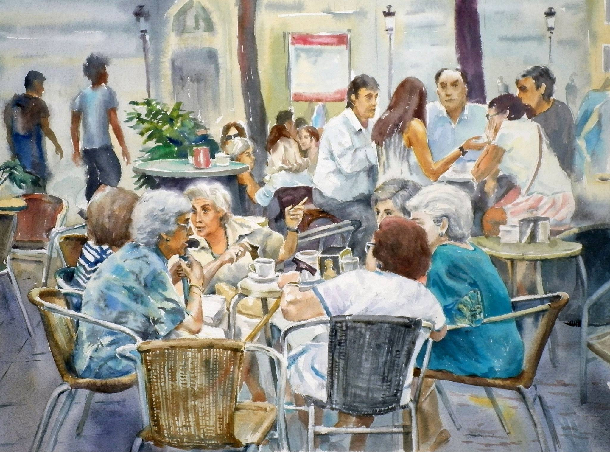 Elderly ladies at the table on the terrace.