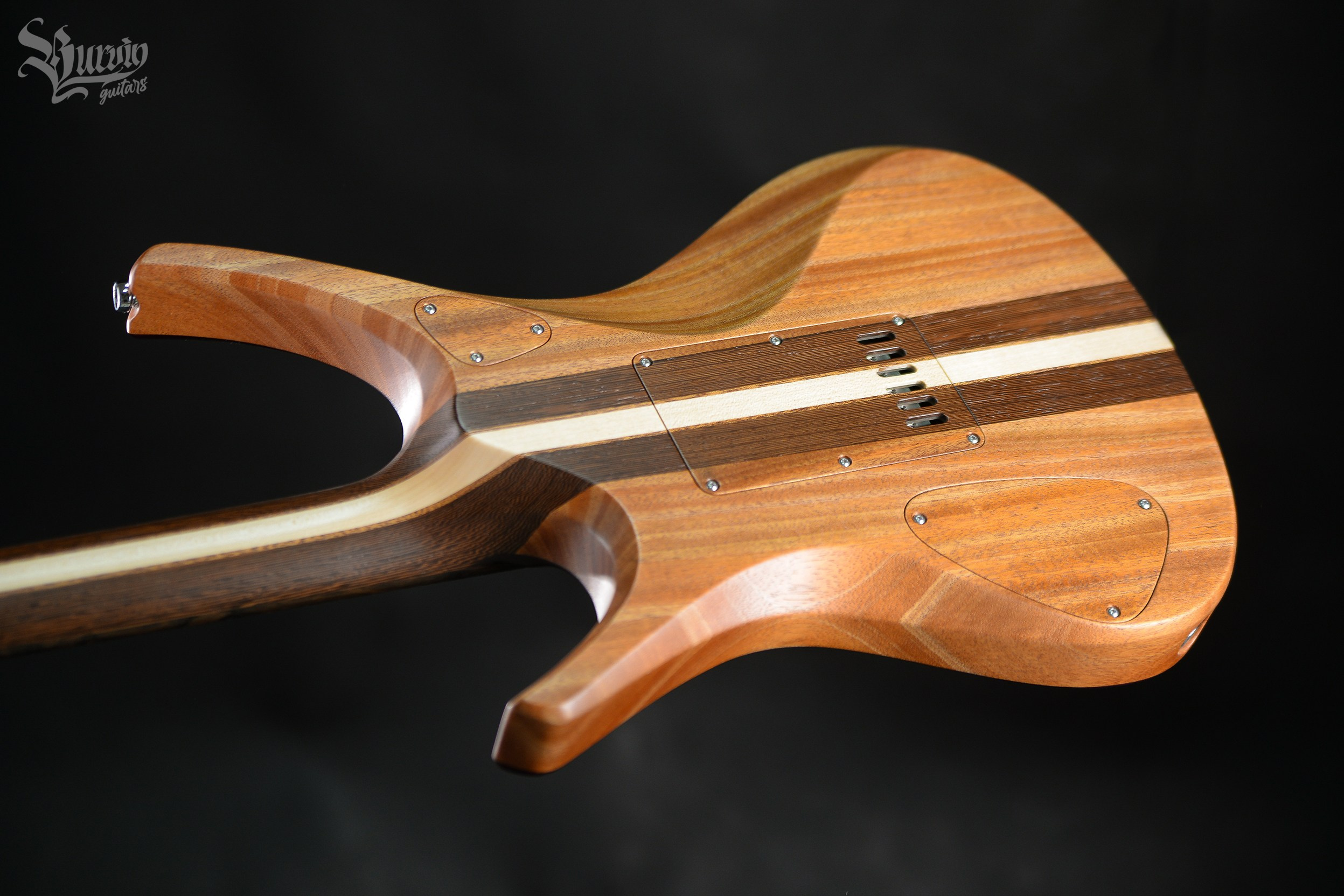 054 AXES. Master of making guitars and basses to order