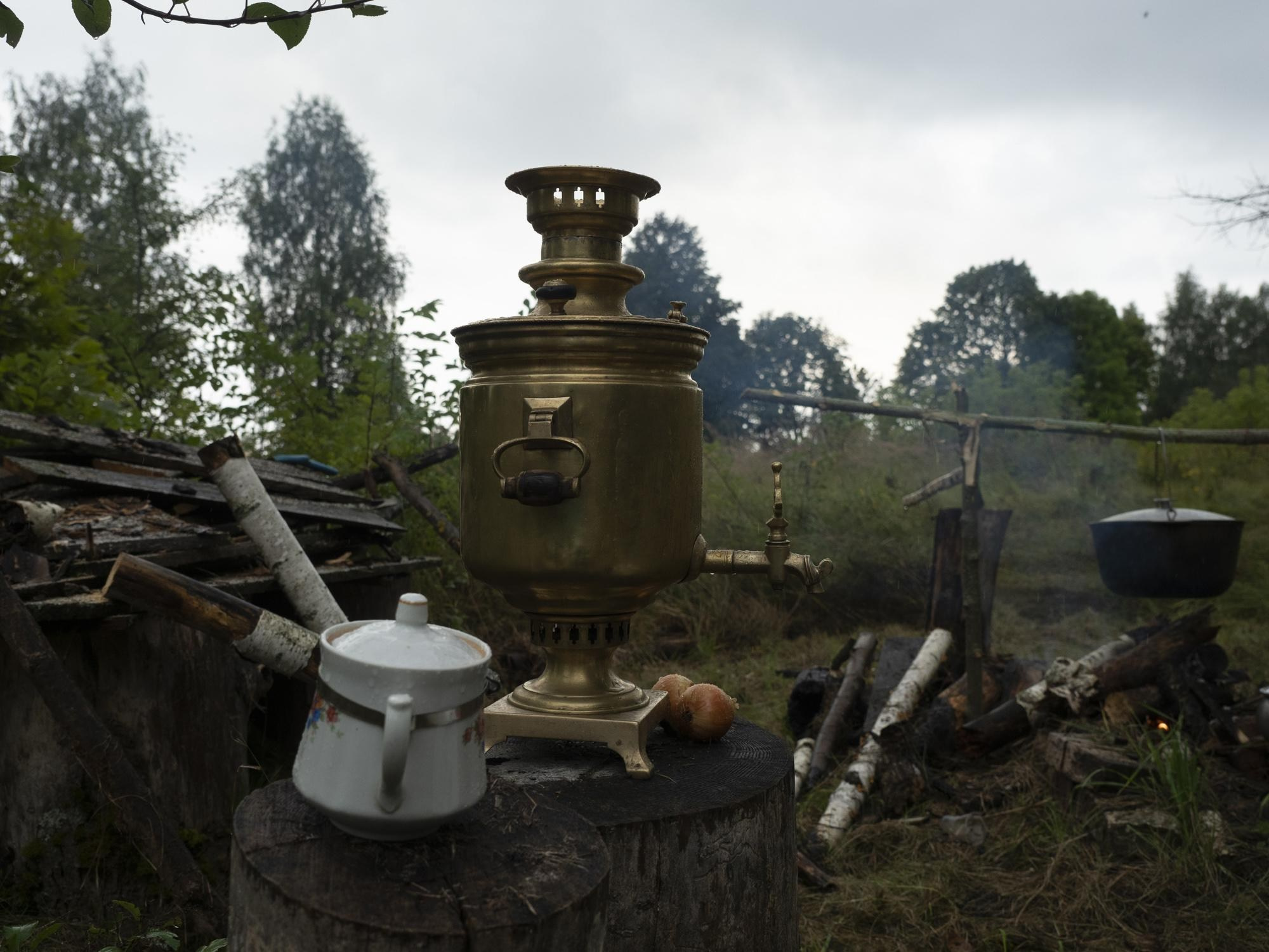 August 28, 2021, Since there is no electricity in the village of Svyatsk anymore, a traditional "samovar" is used to make tea for all participants ("Samovar" - is a device for boiling water and making tea. The water is heated inside of the furnace, which is a high tube, fills the wood coals).