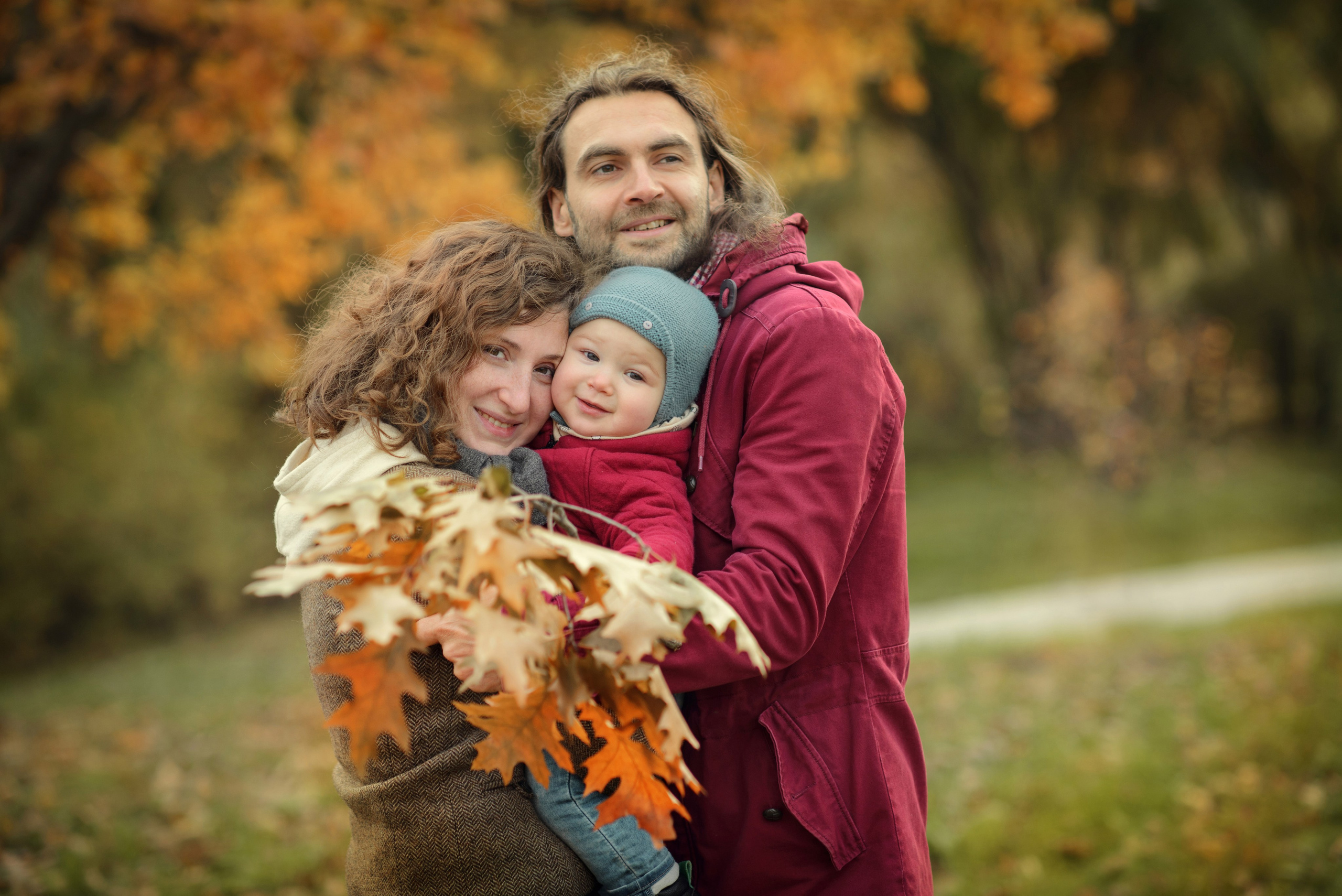 Family photo shoot in autumn. Photos with yellow leaves