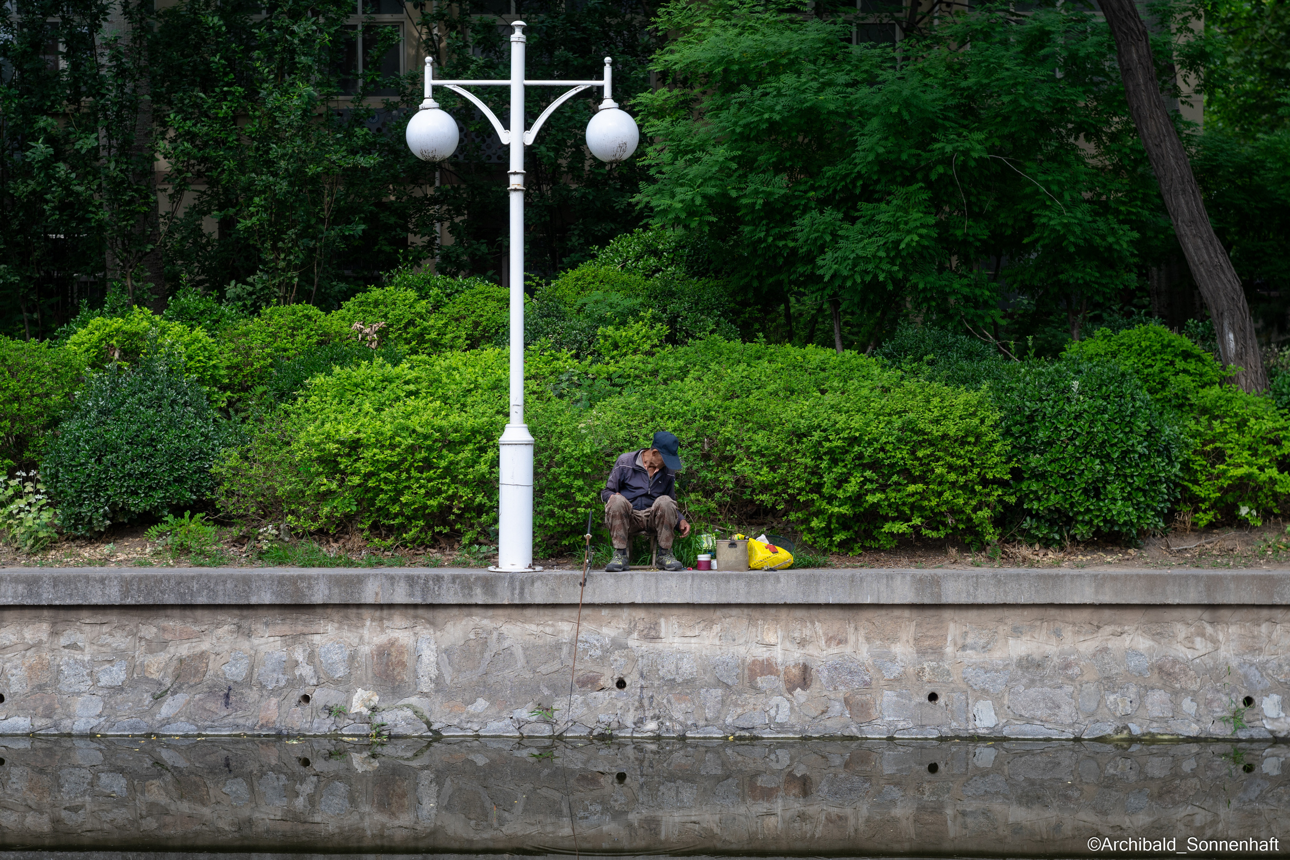 Campaign to the radio station. Photographer in Guangzhou, China. Archibald Sonnenhaft