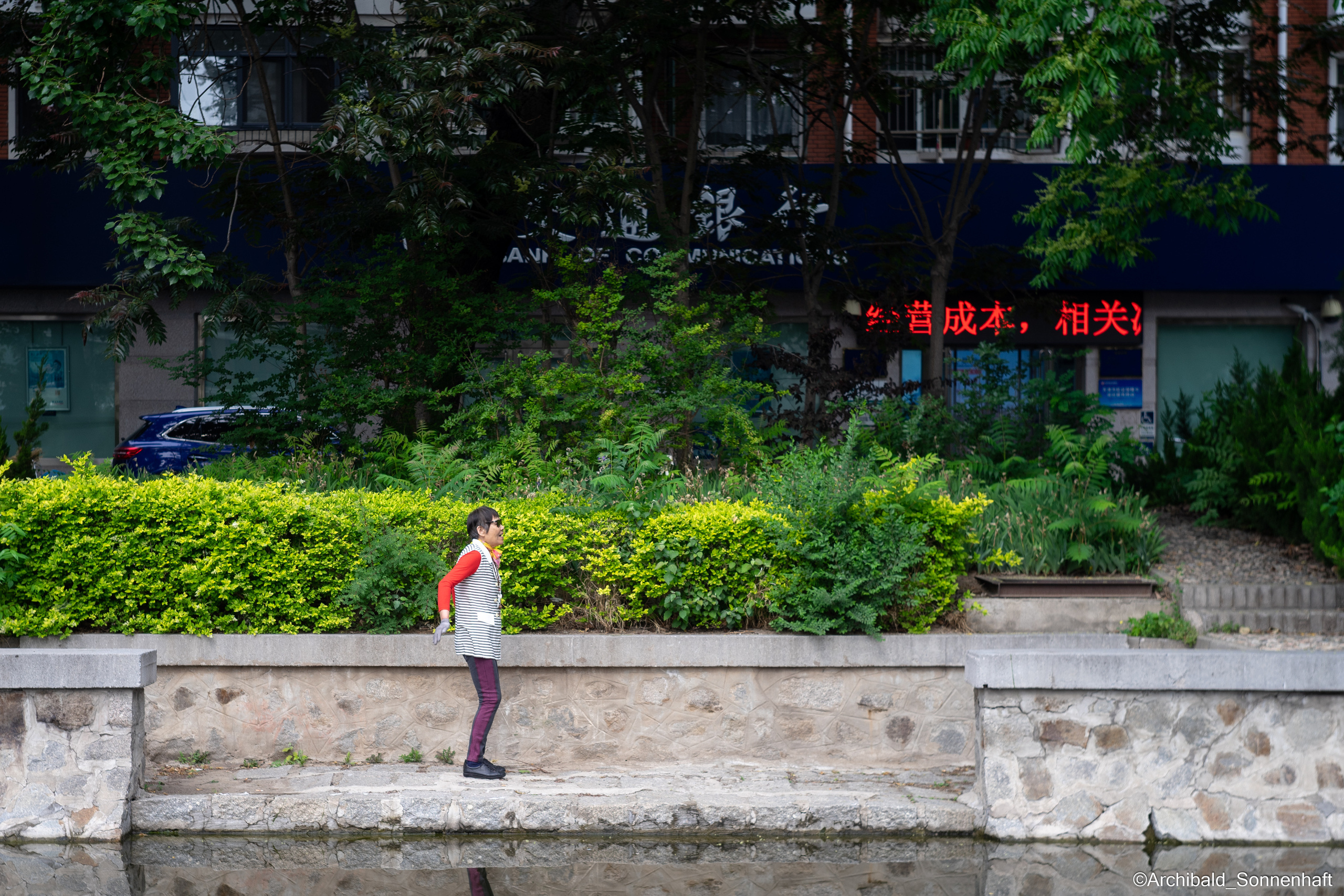 Campaign to the radio station. Photographer in Guangzhou, China. Archibald Sonnenhaft