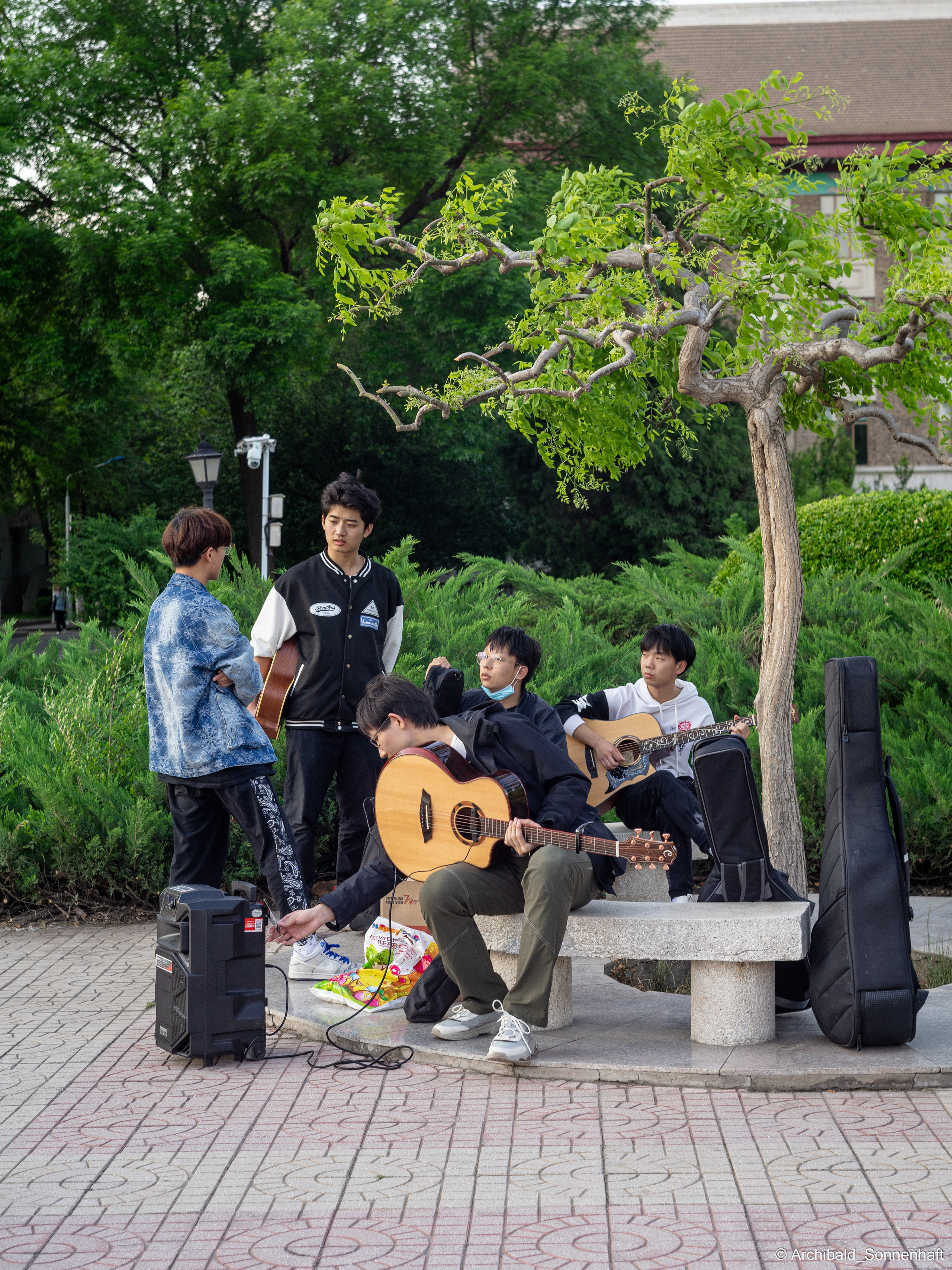 Walking in TJU on the first of May. Photographer in Guangzhou, China. Archibald Sonnenhaft