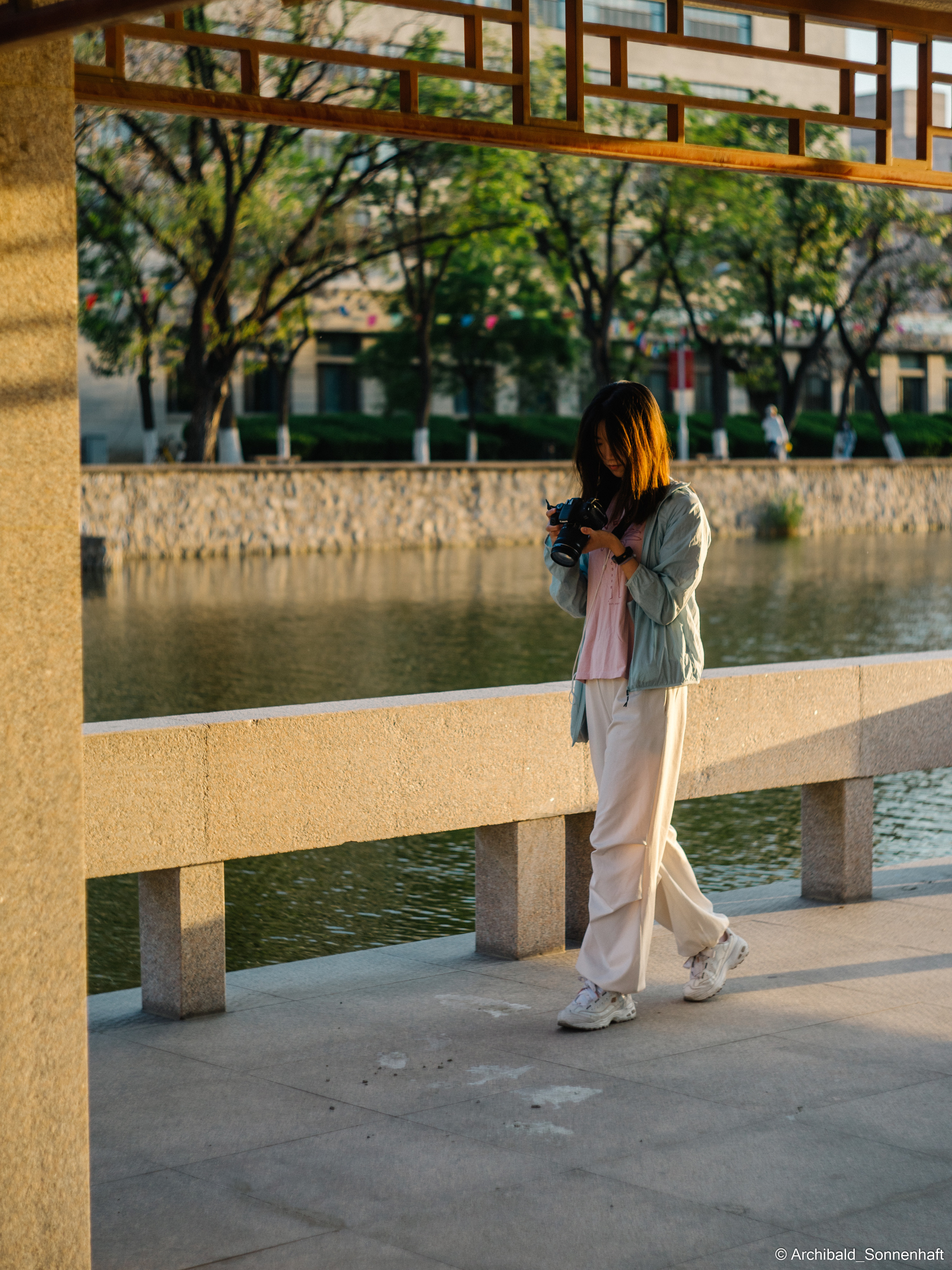 Walking in TJU on the first of May. Photographer in Guangzhou, China. Archibald Sonnenhaft