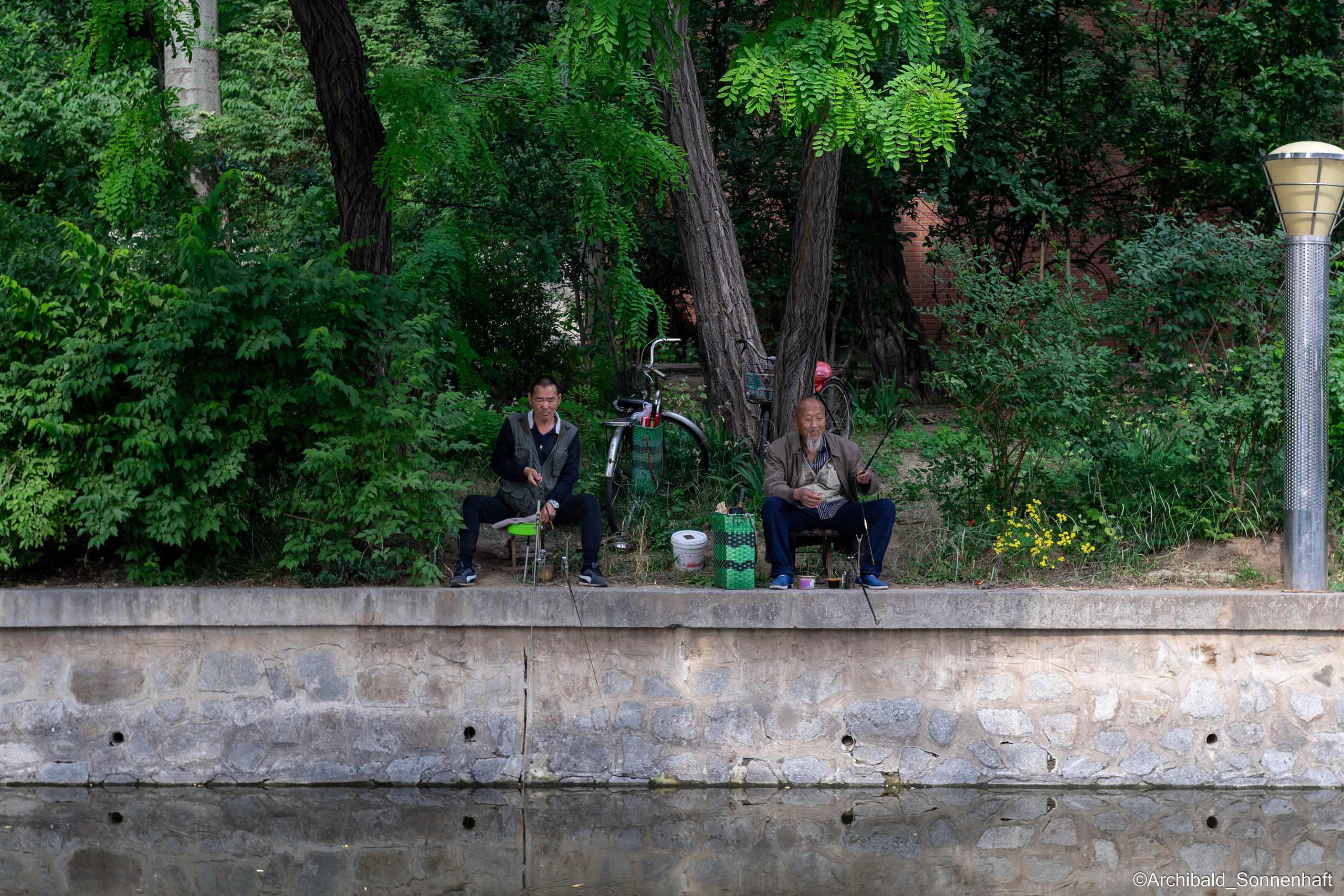 Campaign to the radio station. Photographer in Guangzhou, China. Archibald Sonnenhaft