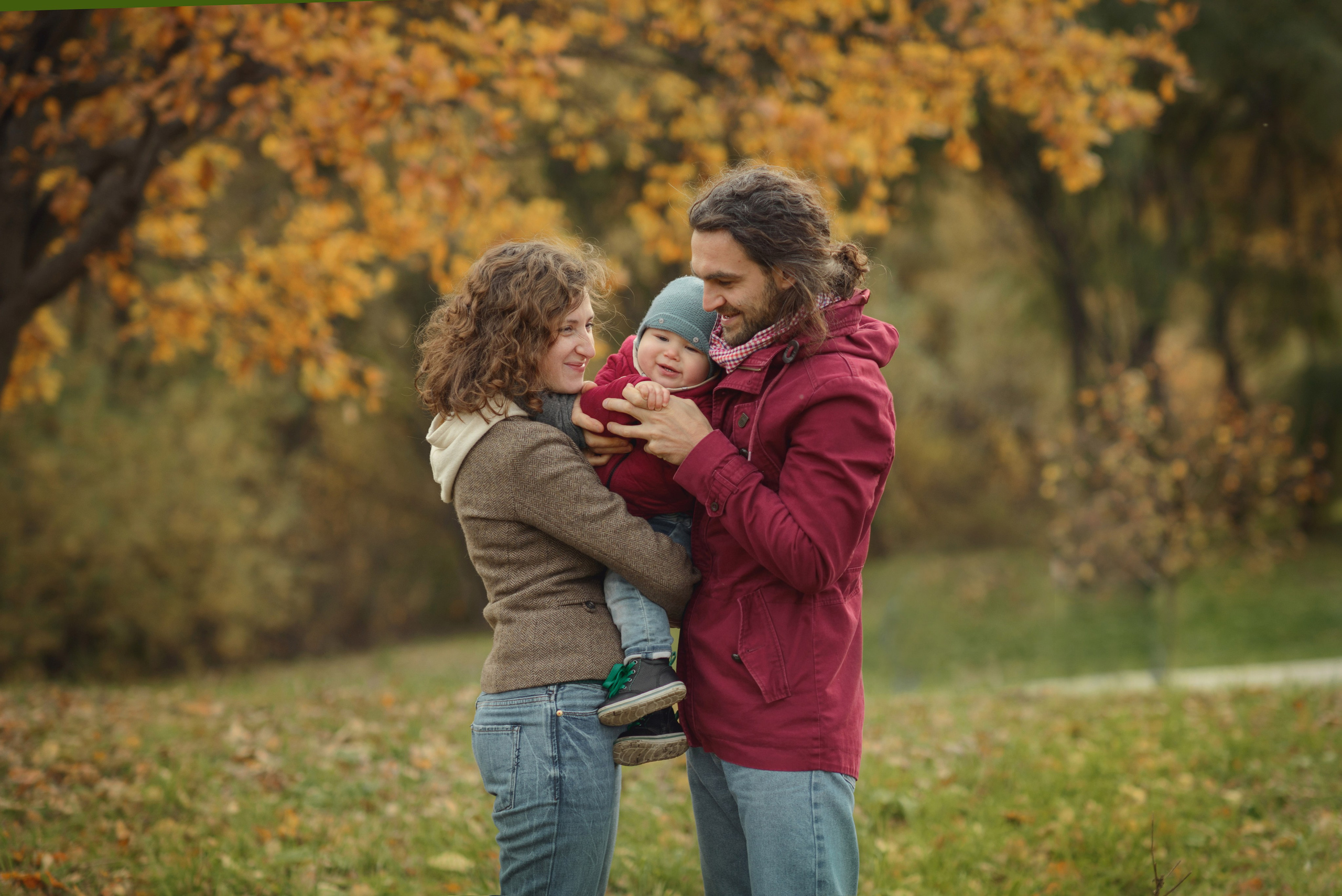 Family photo shoot in autumn. Photos with yellow leaves