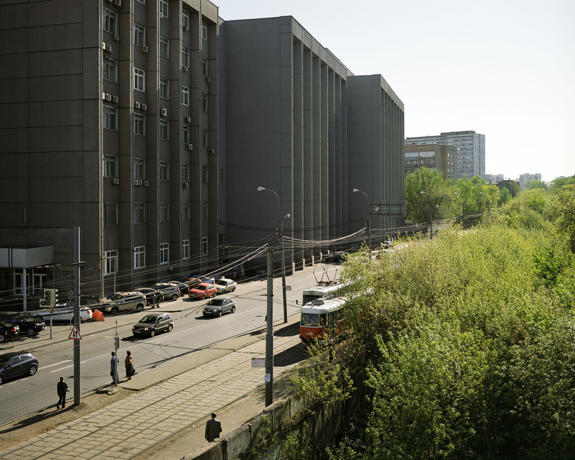 PLATE 42: Non-residential buildings, lamp posts, power lines, trams, cars, figures of people (also includes portable and permanent barriers, A/C units, road sign, traffic lights, tram stop c/w tracks, trees)