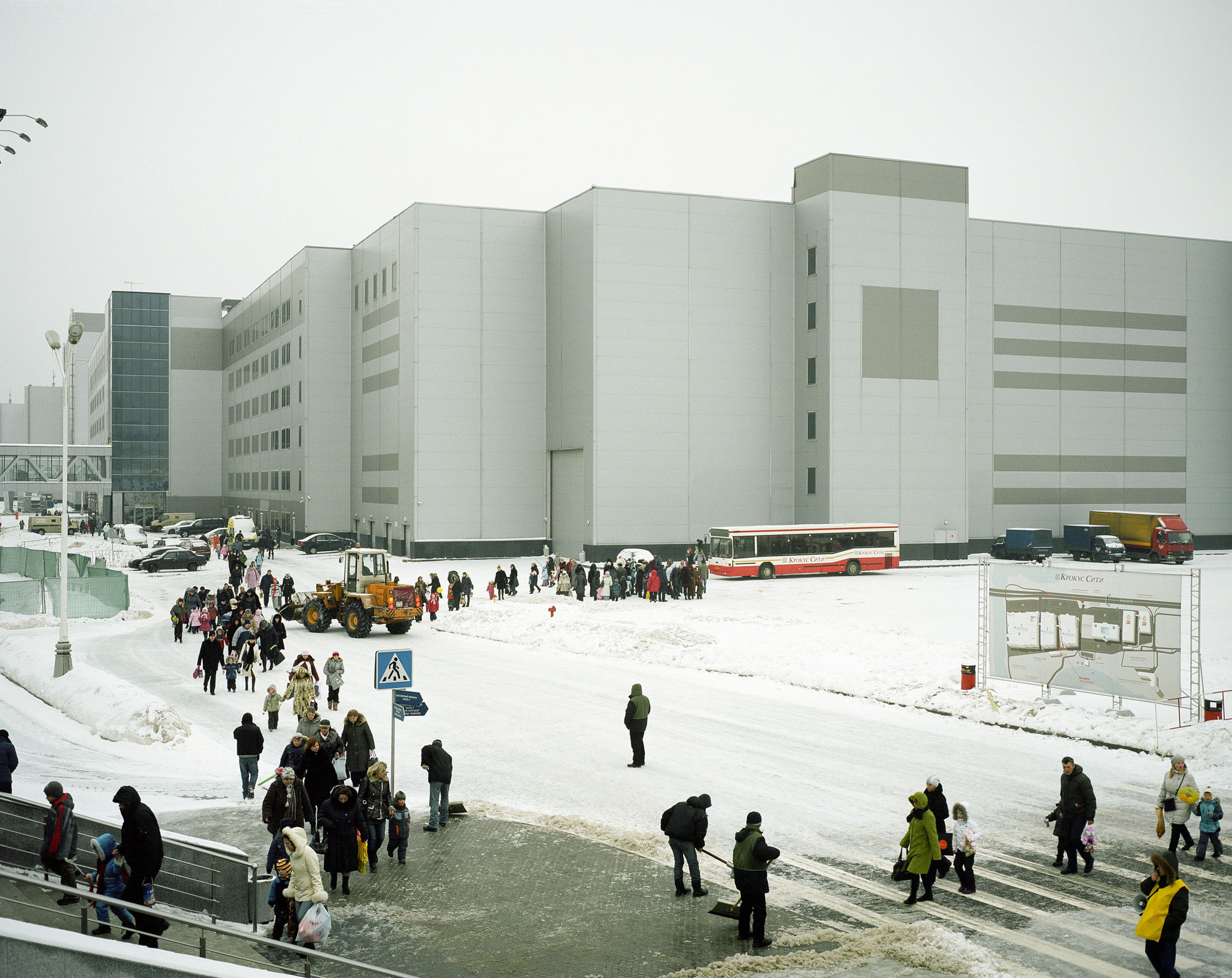 PLATE 3: Modern building, bus, front loader, figures of people at leisure, figures of people working, road signs, information board, stairs c/w hand rails, lamp posts, barriers, cars, trucks, surveillance cameras, waste bins
