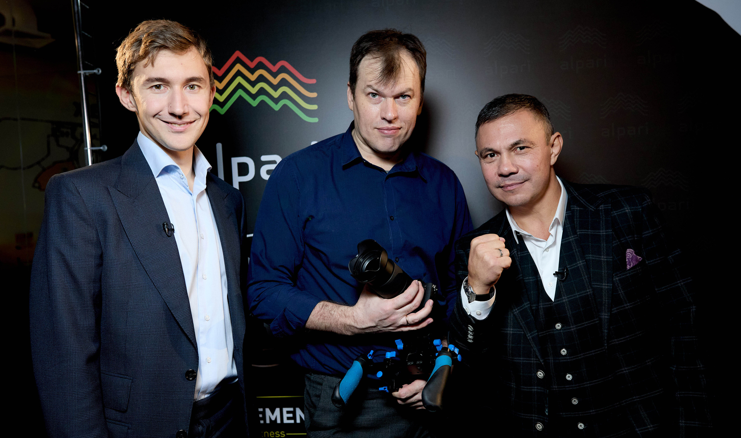 Чемпион по боксу Костя Цзю, шахматист Сергей Корякин и фотограф Александр Гладкий.