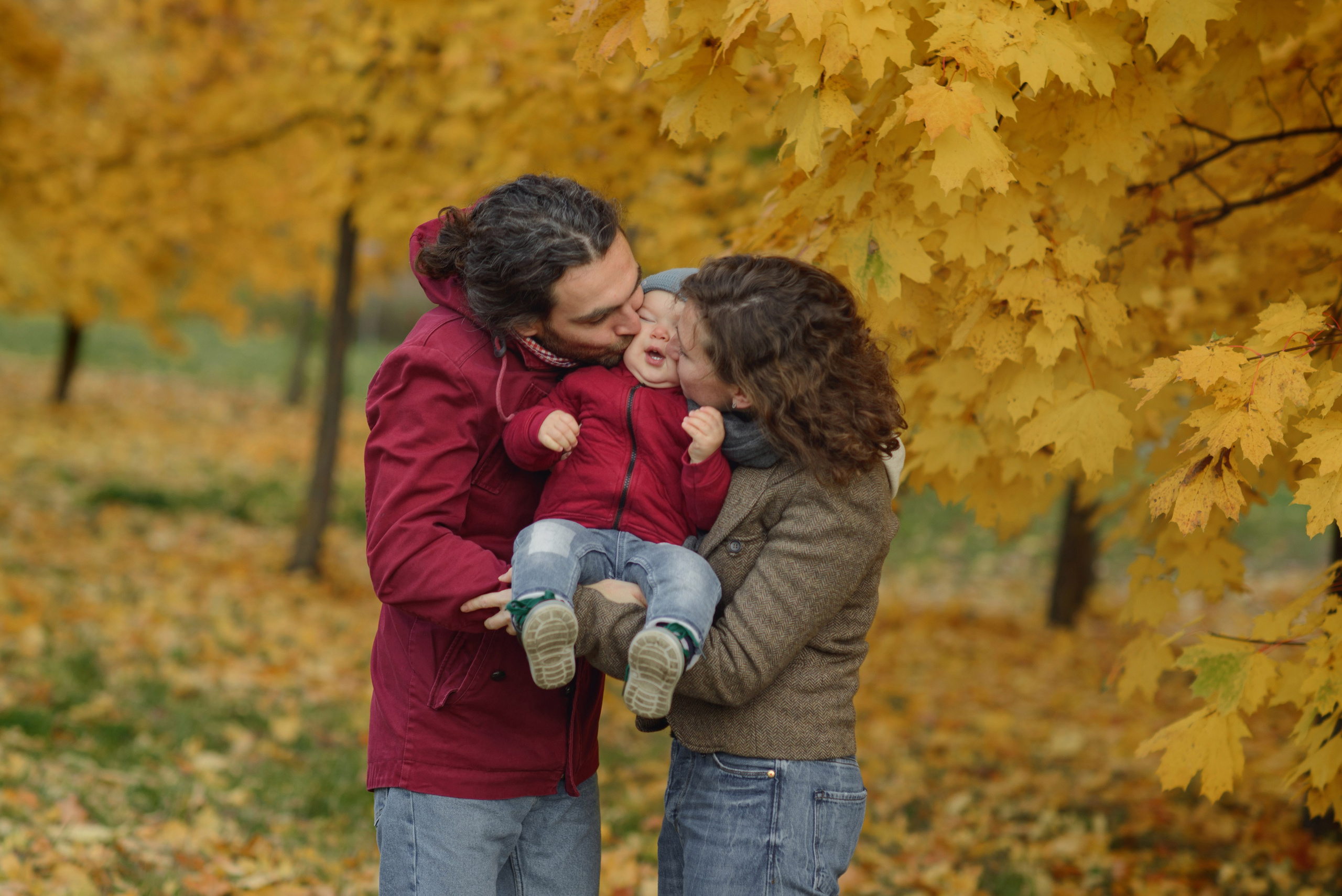 Family photo shoot in autumn. Photos with yellow leaves