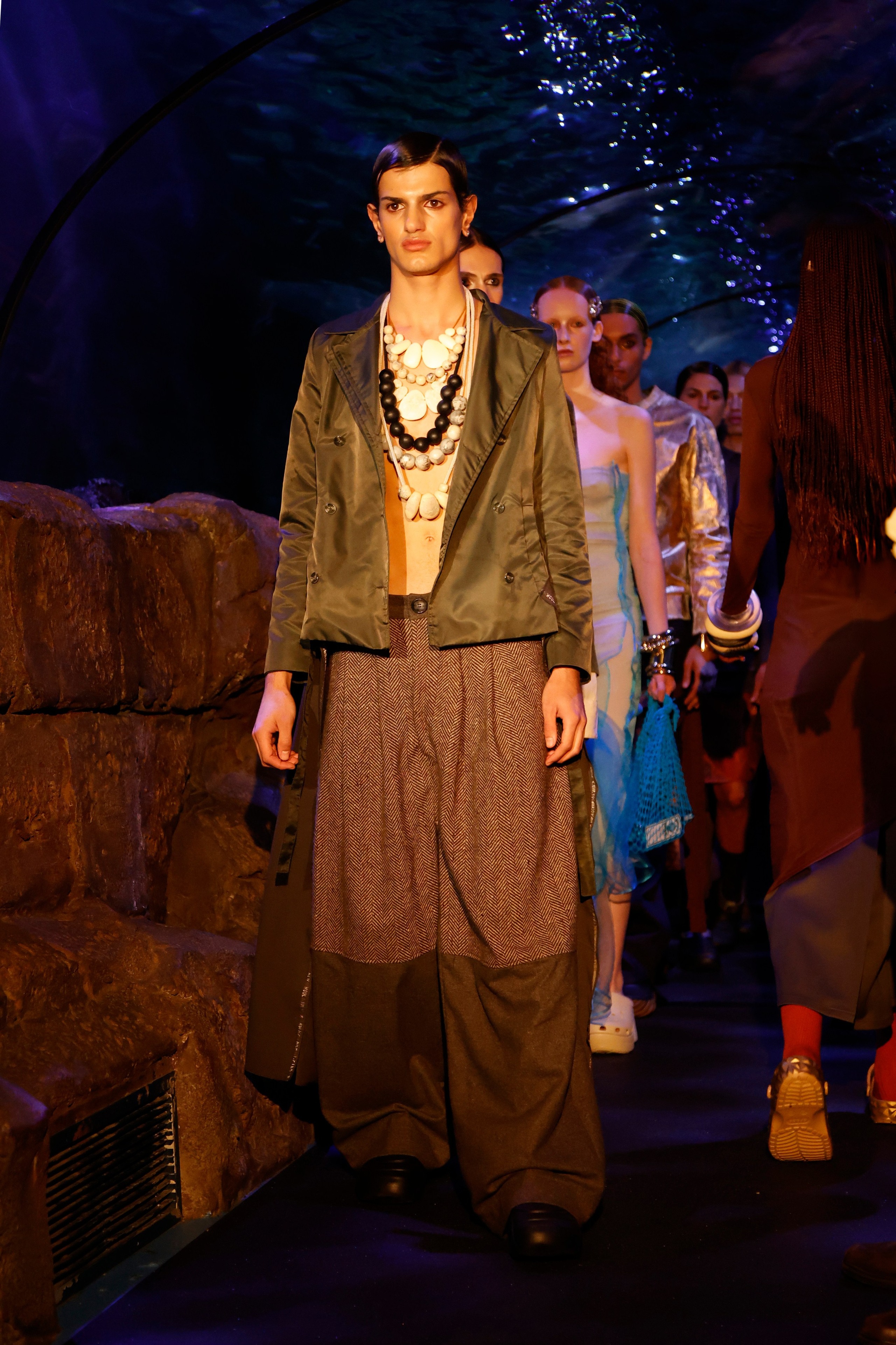 A runway show at the SEA LIFE Sydney Aquarium as part of Australian Fashion Week (AFW) 2024. Speed AFW2025 Resort,  Electric Sun.