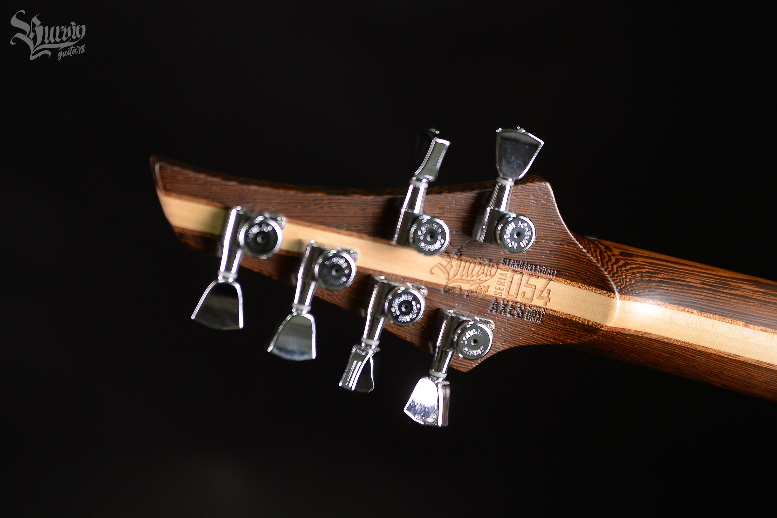 054 AXES. Master of making guitars and basses to order