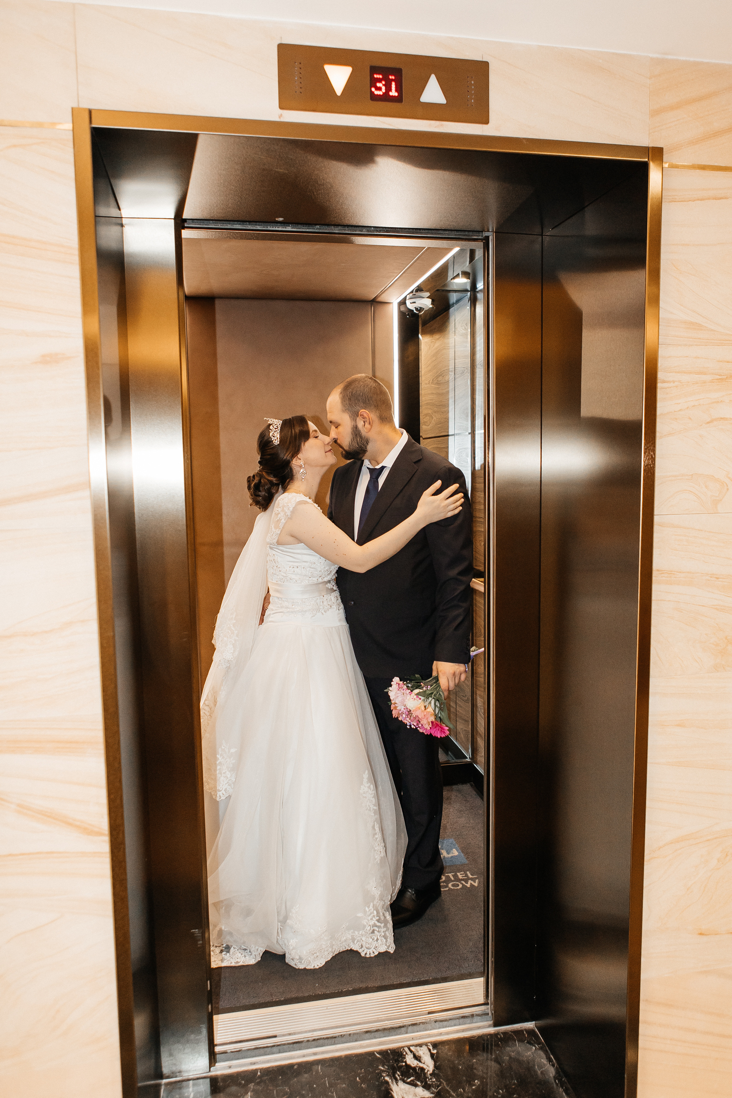 Свадебная фотосессия в отеле Radisson Blu Olympiyskiy Hotel Moscow 5*