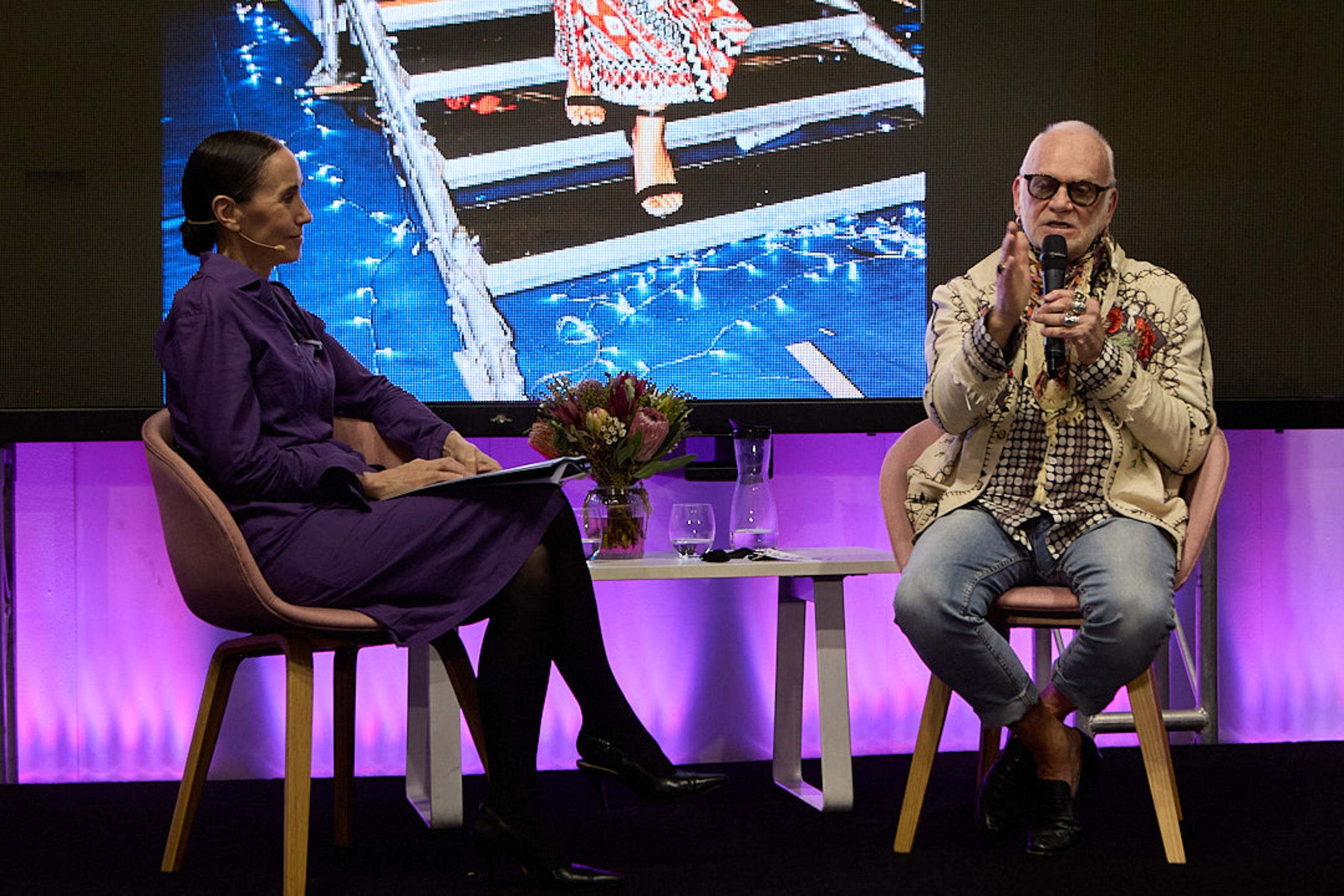 Patty Huntington interviewing Nicholas Huxley during a live discussion at ICC Sydney.