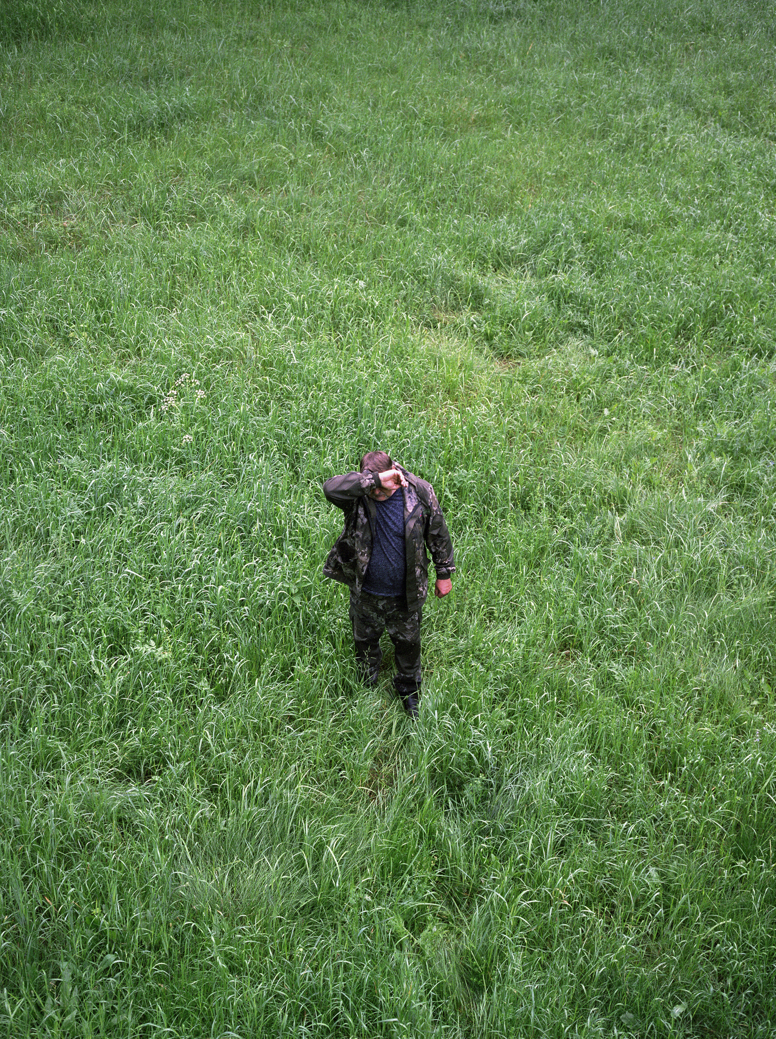 Vladimir Vladimirovich, an inspector and Head of the Fire and Chemical Department, seen from anobservation tower. Gorelaya Hatka district, Bryansk Natural Reserve, 2021