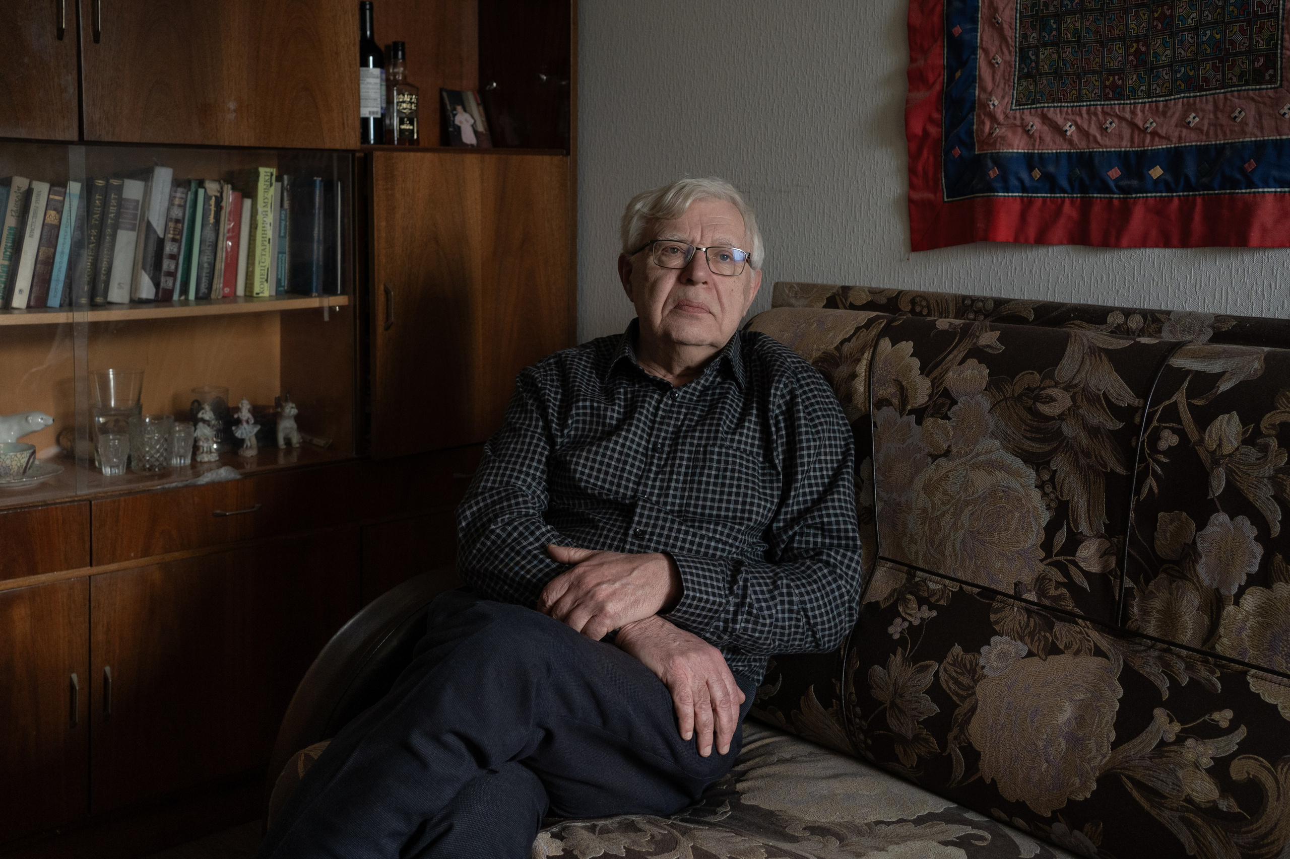 Anatoly Korolev in his apartment. Anatoly is the father of Vsevolod Korolev - a documentarian, tour guide, and poet, sentenced to 3 years of imprisonment for discrediting the Russian army. The reason for Vsevolod's case was two posts on the Russian social network "VKontakte" about the events and actions of the Russian army in Ukraine’s Bucha; where mass murders of civilians, as well as kidnappings and torture, were committed in March 2022. Vsevolod has serious chronic illnesses: his thyroid gland has been removed, and he has intervertebral hernia. Vsevolod was deprived of his freedom on July 12, 2022.