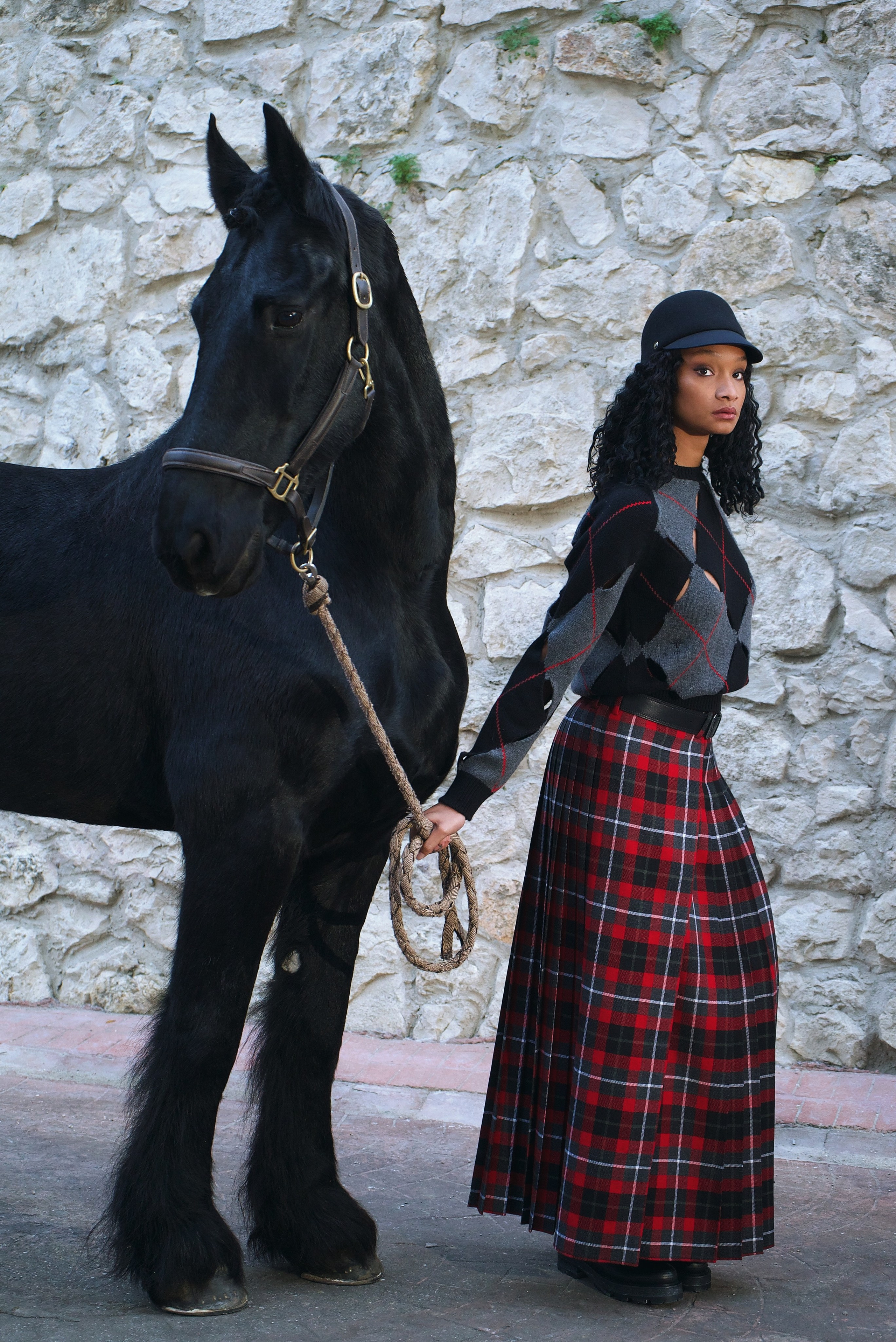 Fashion portrait with horse during Esquire Turkey photoshoot at Lider Horse Base