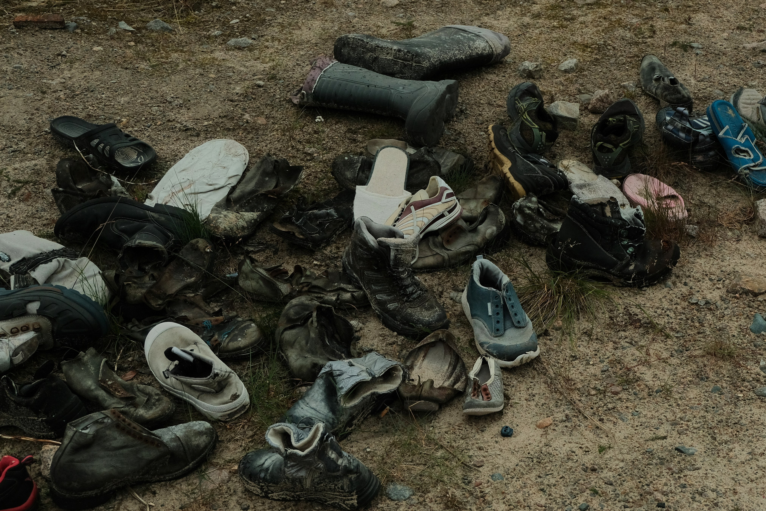 pile of shoes on the ground