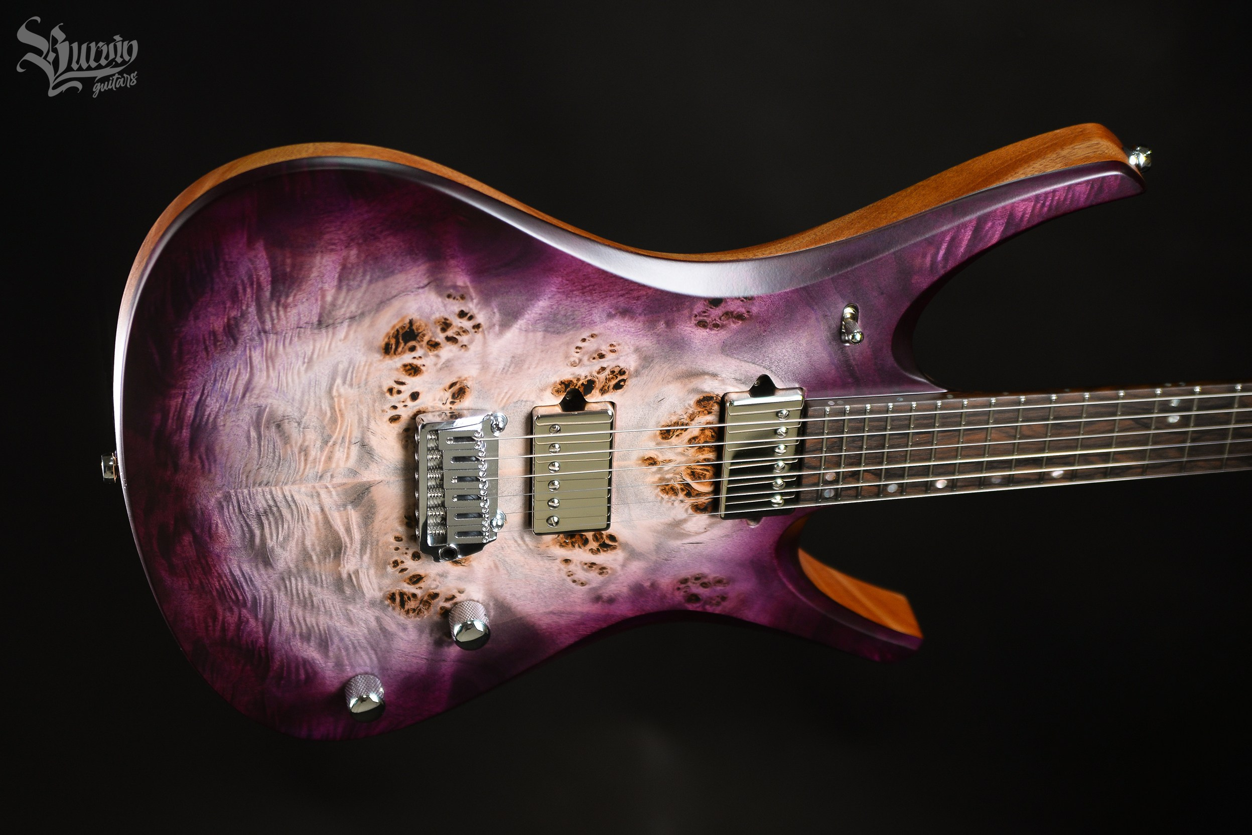 054 AXES. Master of making guitars and basses to order