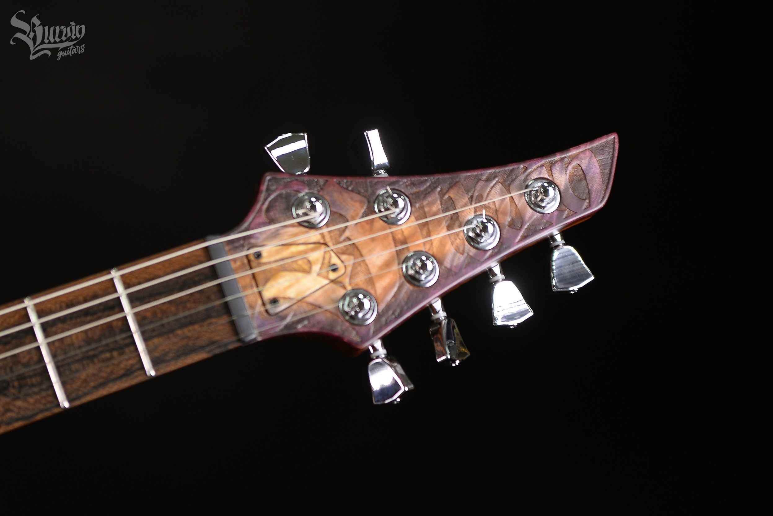 054 AXES. Master of making guitars and basses to order