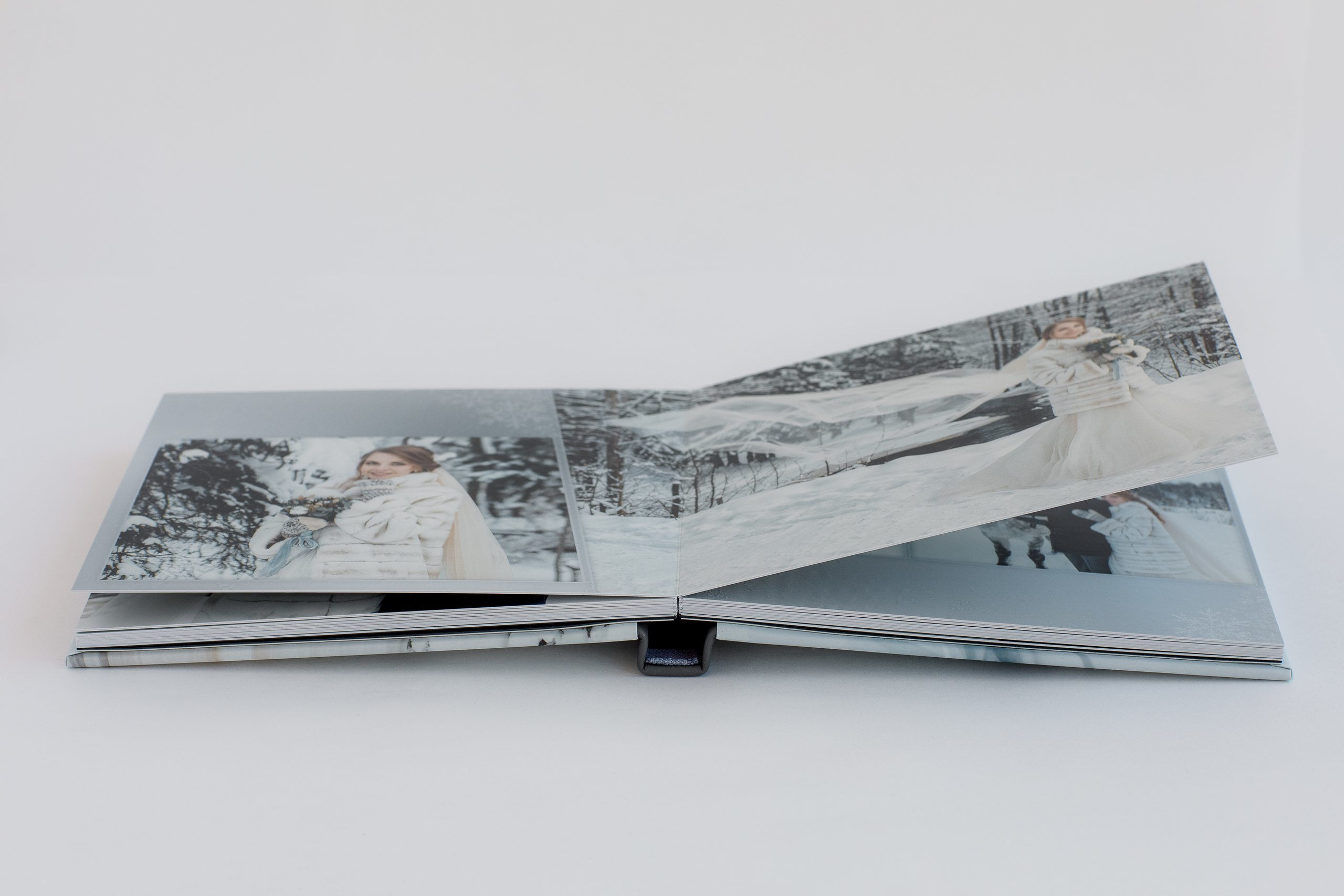 Альбом с примерами свадебных книг. Свадебный фотограф в Санкт-Петербурге Волощук Евгений