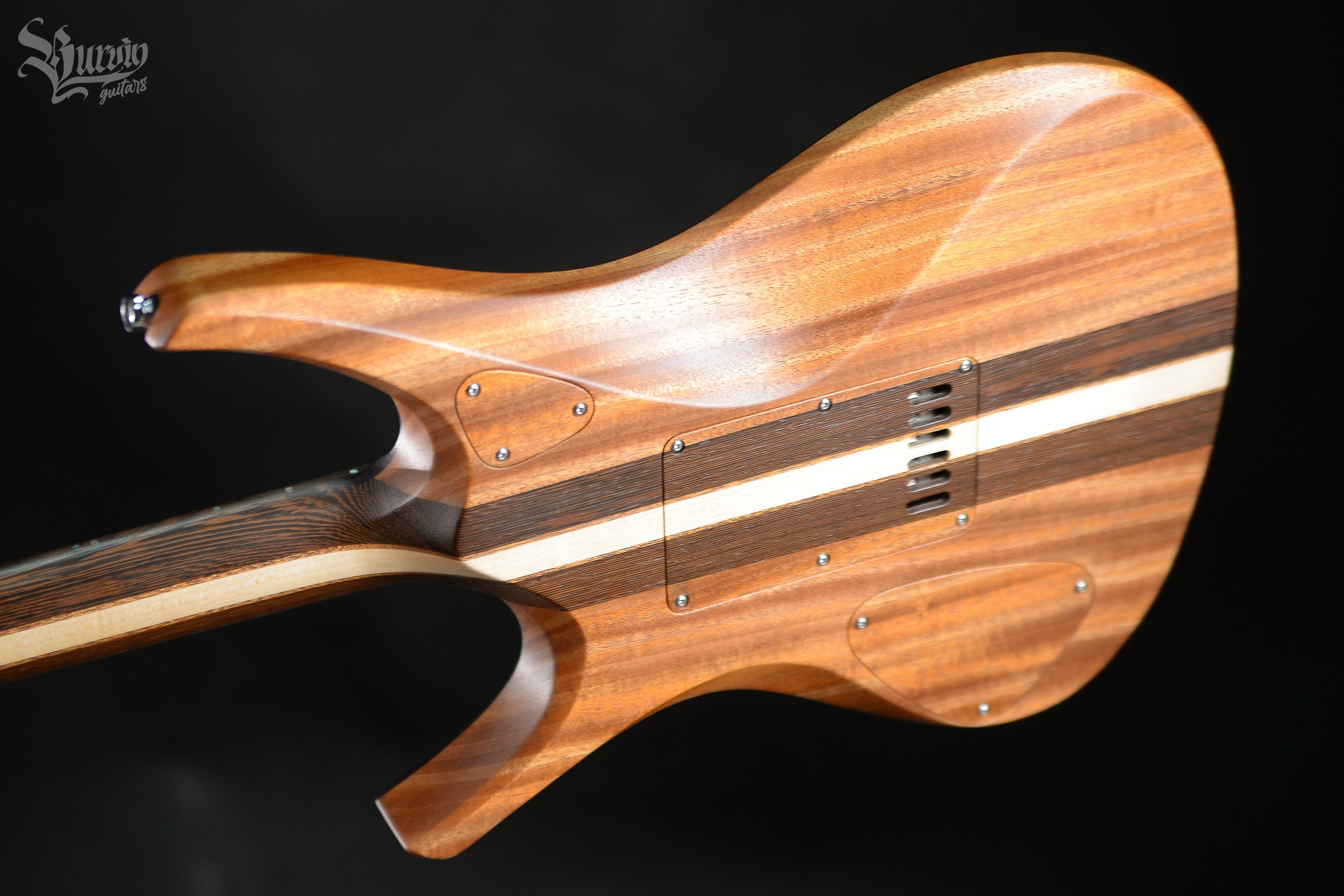 054 AXES. Master of making guitars and basses to order