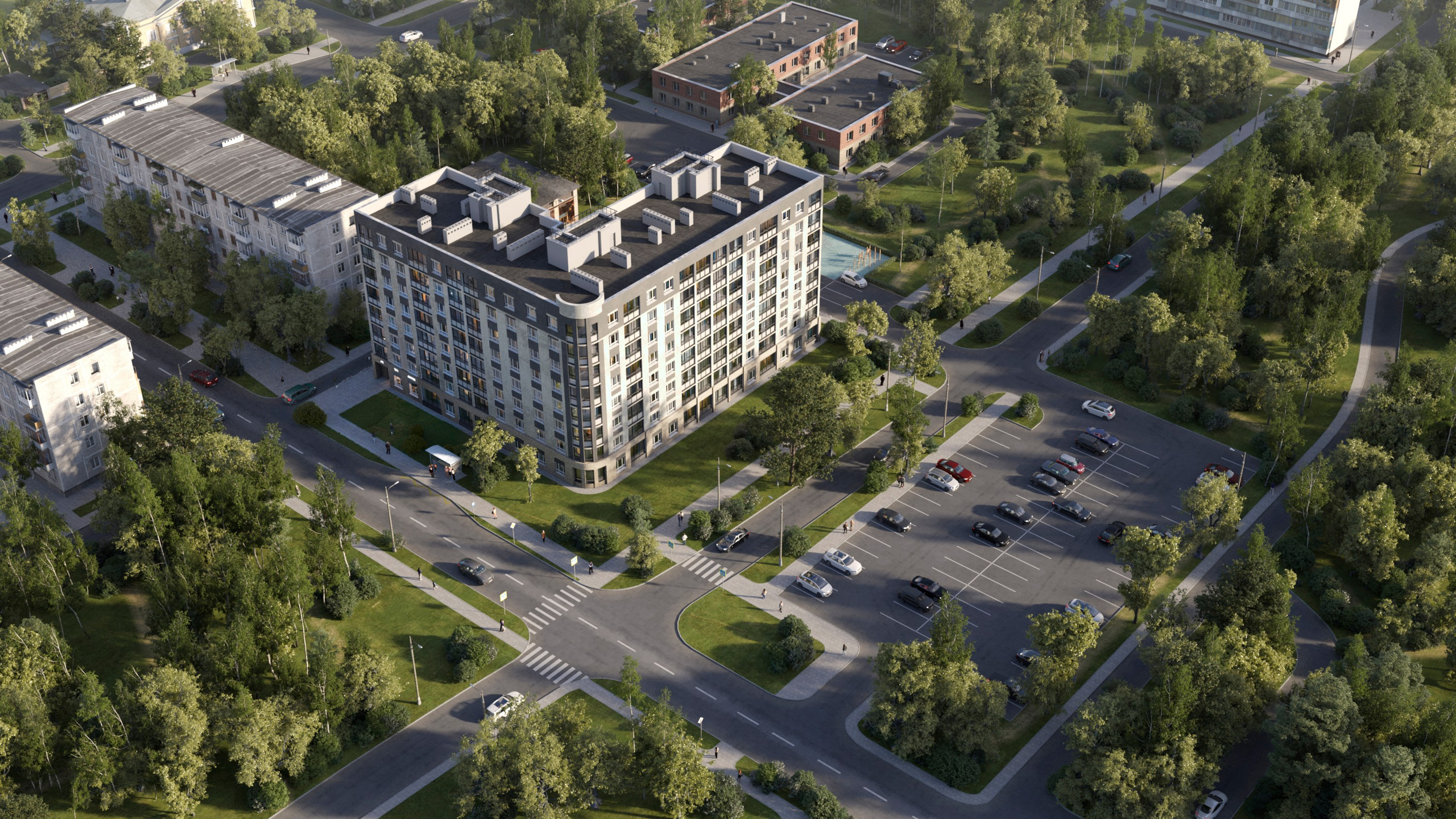 Аэровид жилого комплекса с развитой инфраструктурой, парковочными зонами и большим количеством зеленых посадок