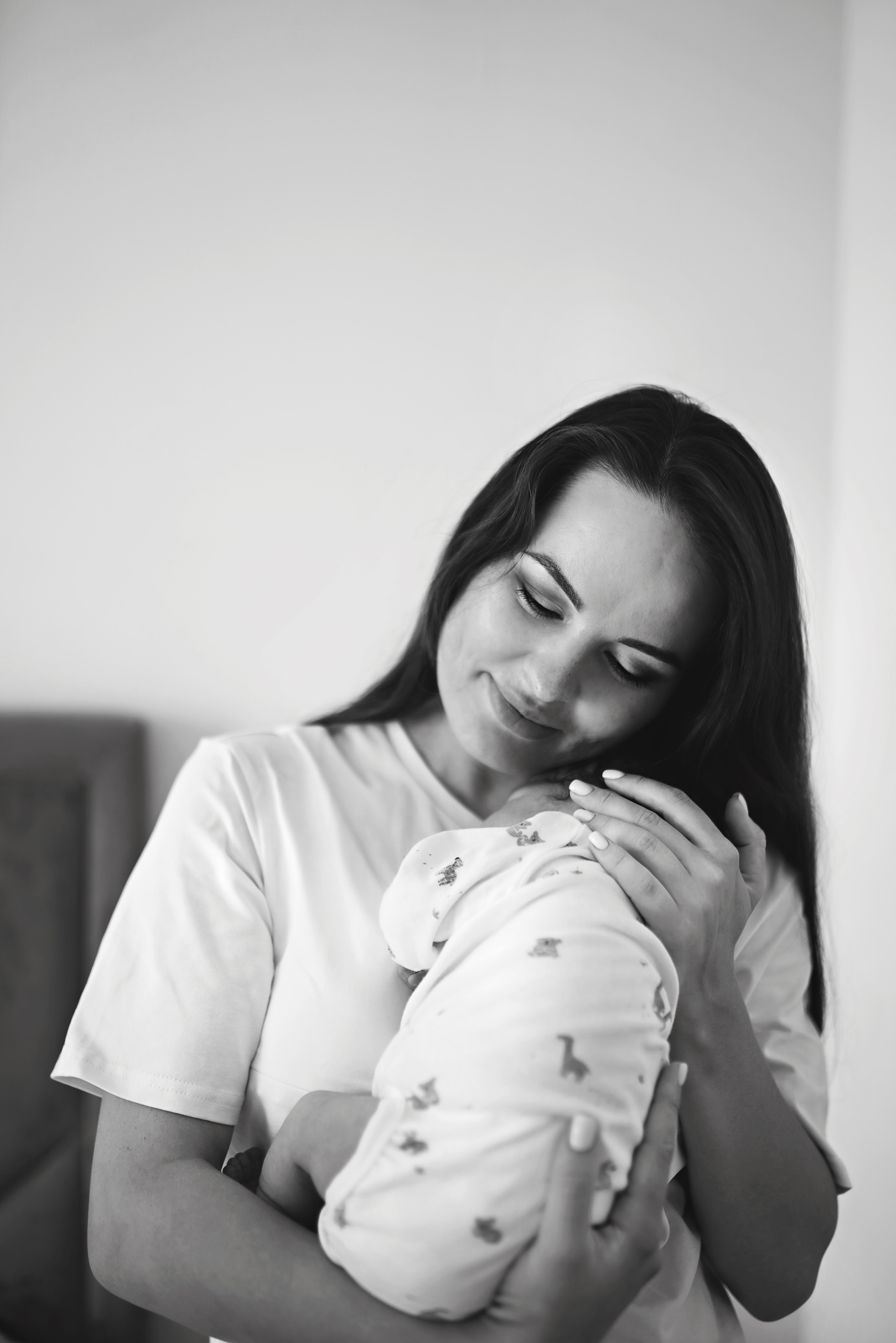 Close-up of newborn’s first cry during a birth photoshoot
