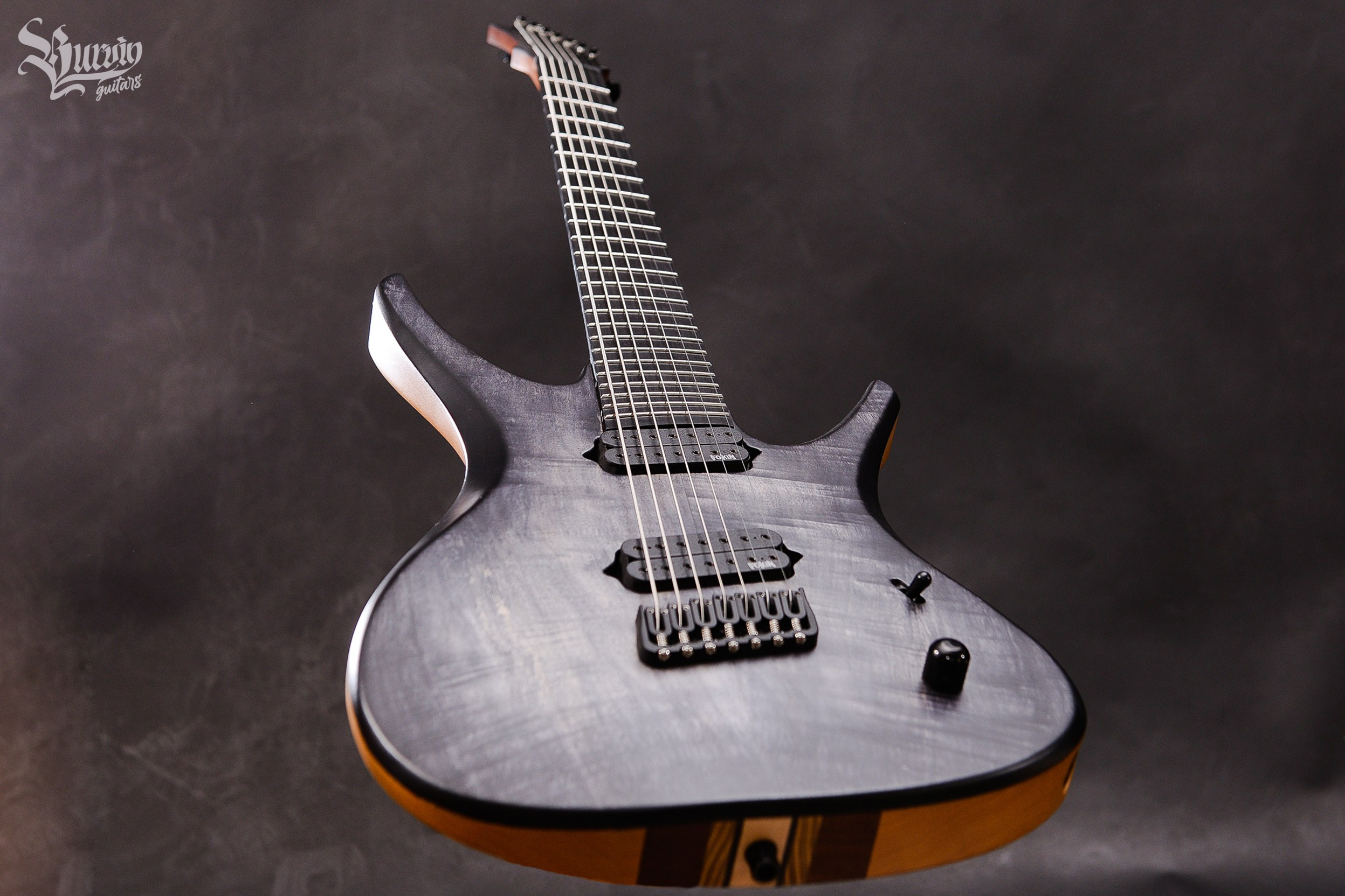 023 AXES. Master of making guitars and basses to order