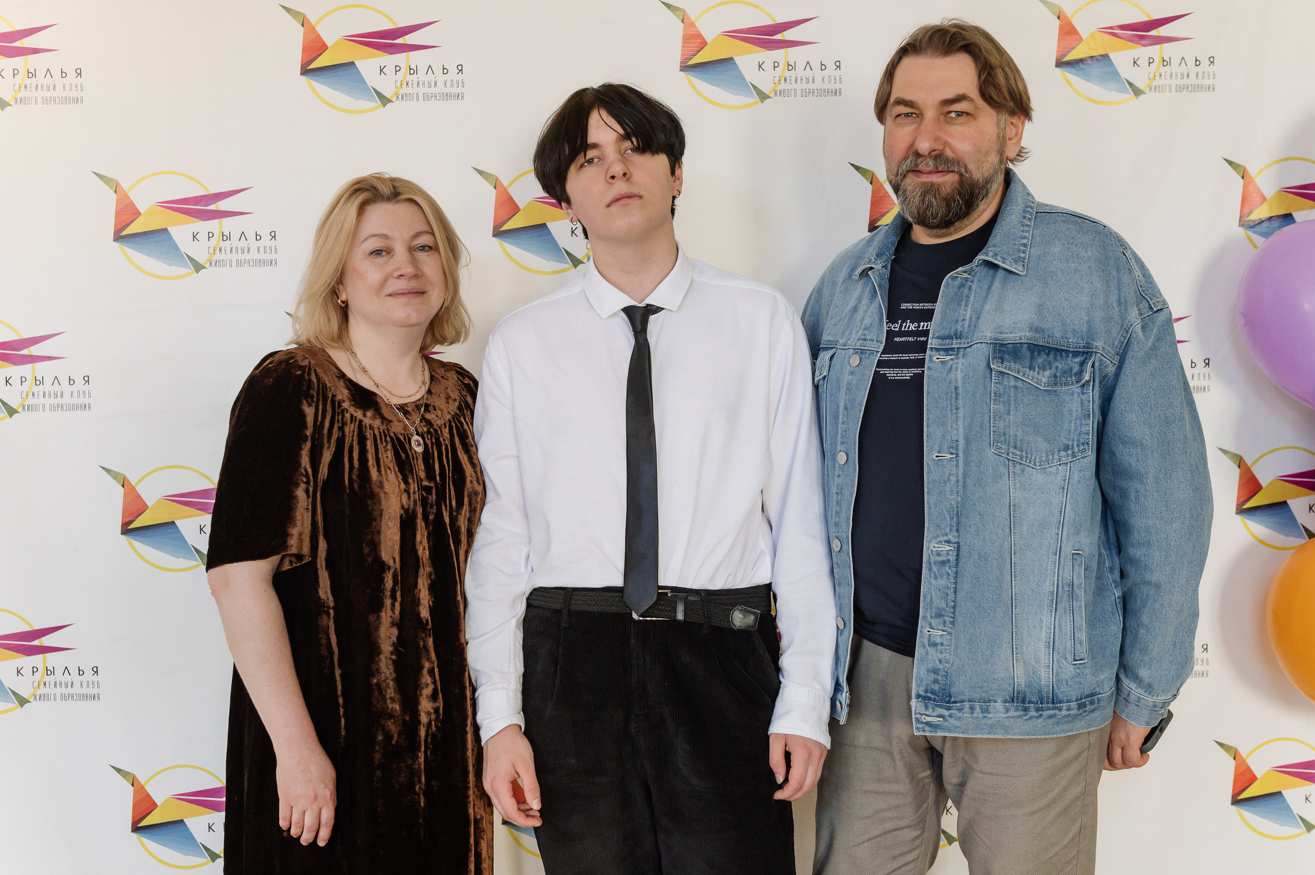 выпускник с родителями