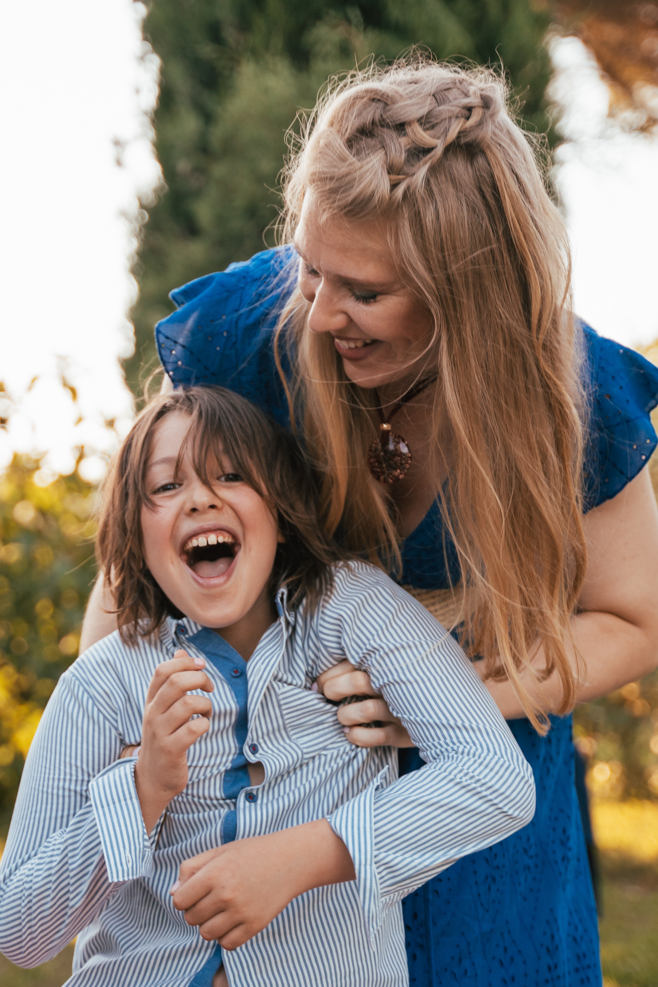 Smiling family members enjoying a sunny day
