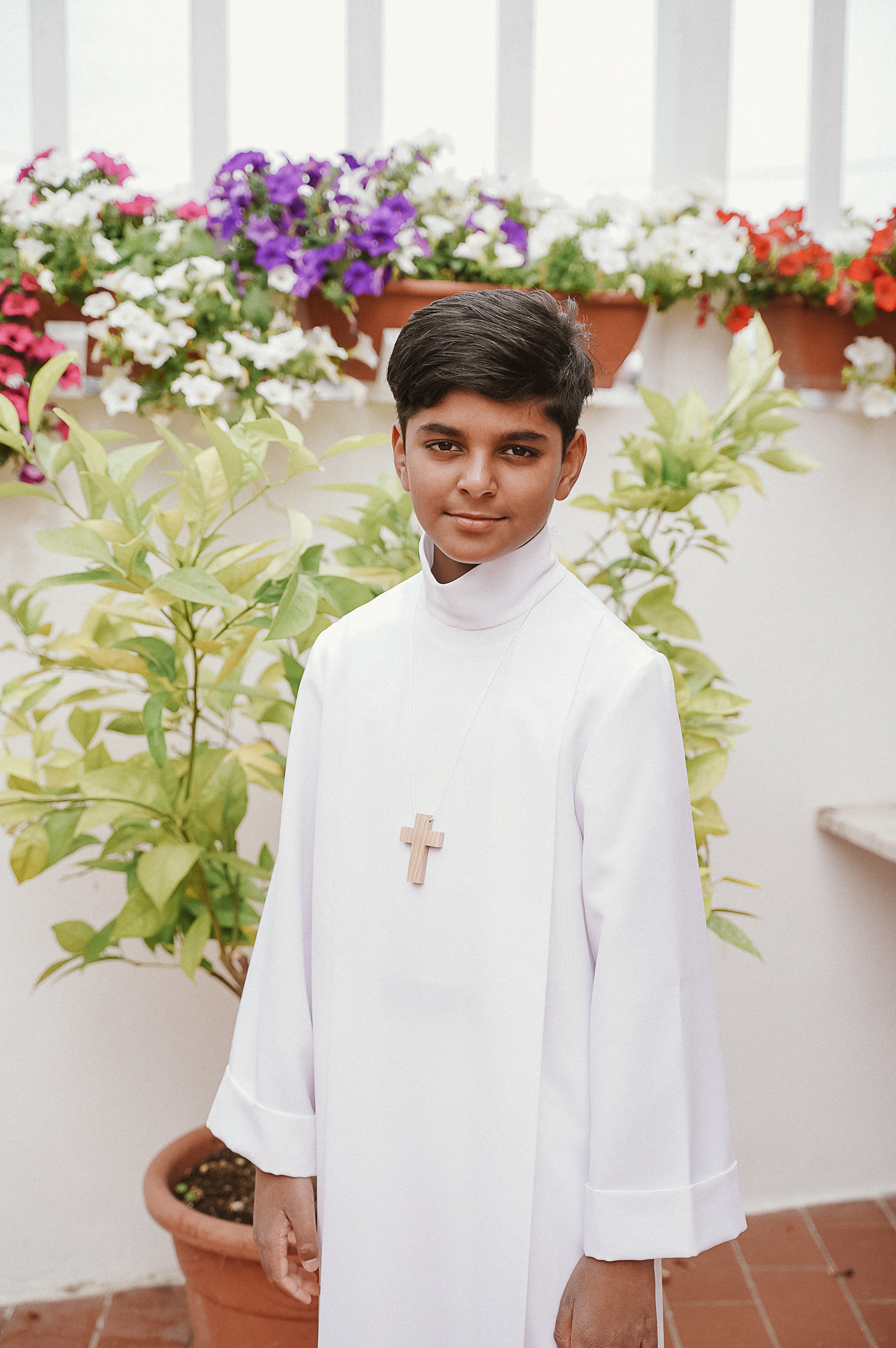 Kenneth Comunione. Family Lifestyle Photographer in Lucca, Italia