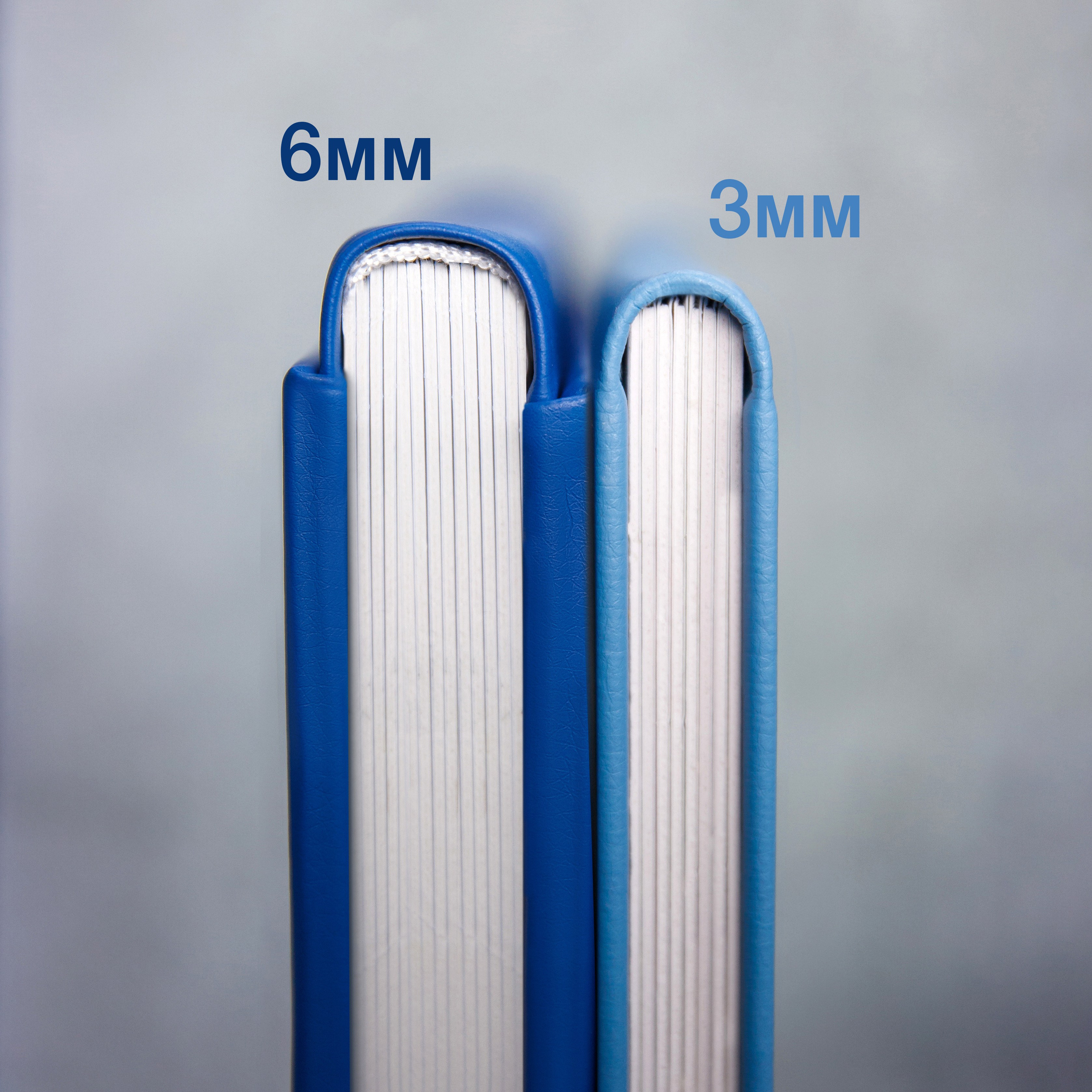 две книги разной толщины