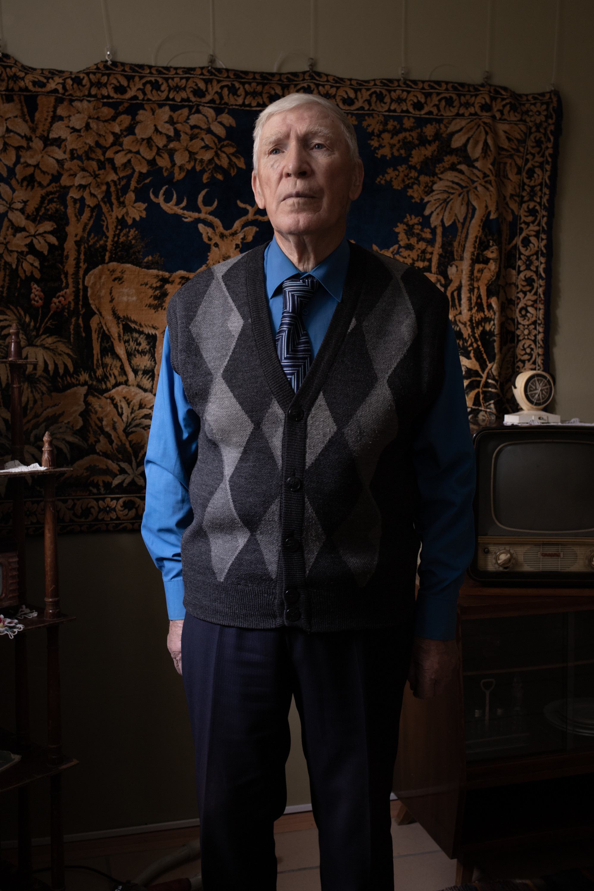Lieutenant Colonel Nikolai Ivanovich Tulov poses at the Local History Museum, where he gives extracurricular history lessons to schoolchildren. Between 1978 and 1981, he served as an advisor to the chief of infantry brigade staff in the Republic of Angola. He spoke warmly of working with the Angolans and mentioned that both countries’ military considered each other brotherly peoples that had to unite against colonialists. Nikolai Ivanovich is a veteran of many battles in Angola. His house was damaged during one of the bombings, which left a deep trace in his memory.