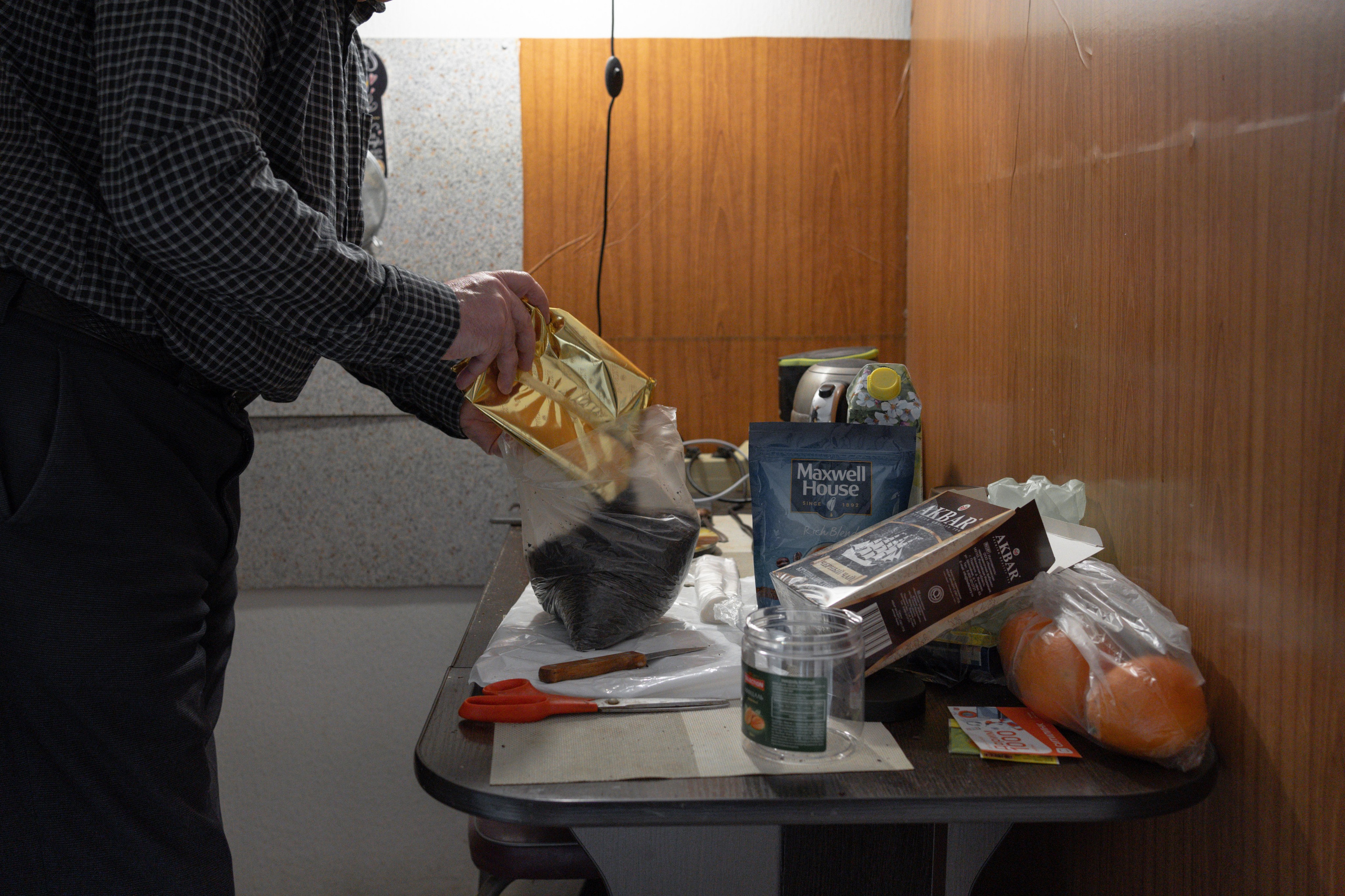 Anatoly Korolev, Vsevolod Korolev's father, prepares the transfer for his son to the pre-trial detention center, pouring all the products into cellophane bags. All products in the detention center for Vsevolod, except for products in vacuum packaging, must be poured into cellophane bags.