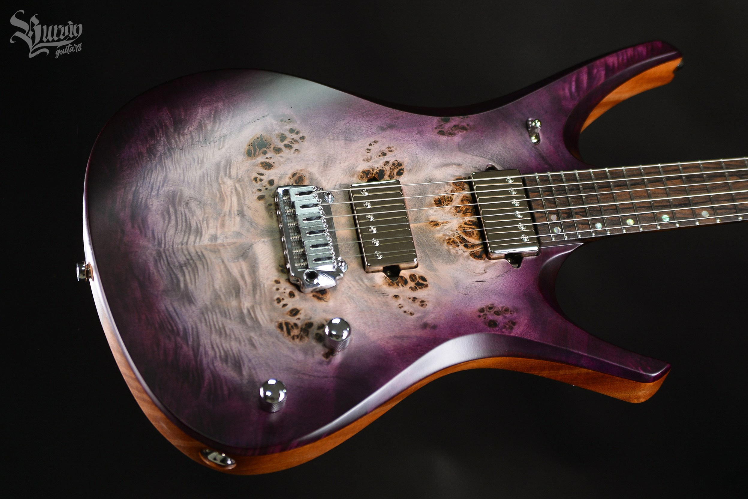 054 AXES. Master of making guitars and basses to order