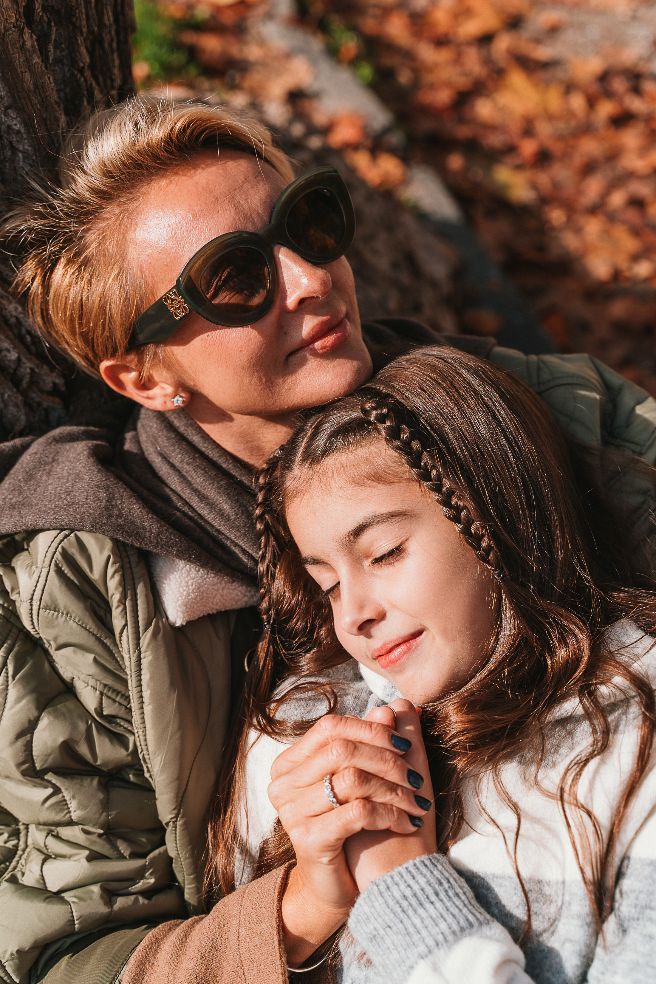 Mother and daughter share a special moment in the scenic Tuscan, creating beautiful memories together