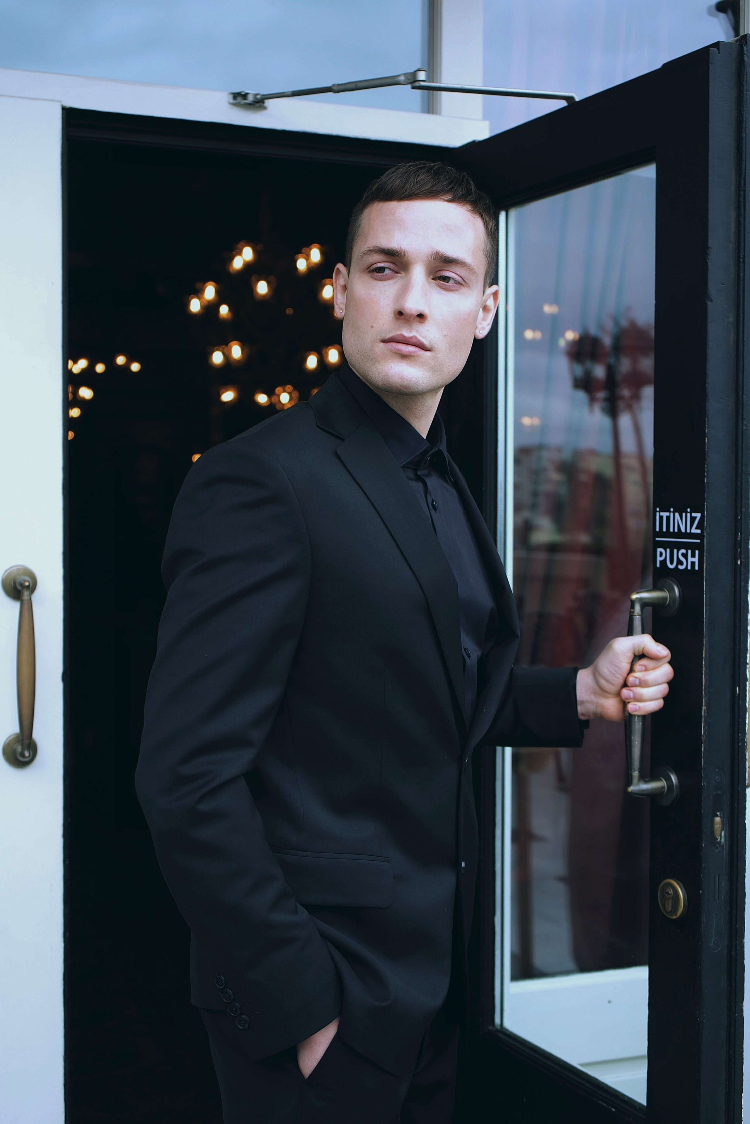 Elegant male fashion portrait at Pera Palace Hotel photographed by Sergio Maiis
