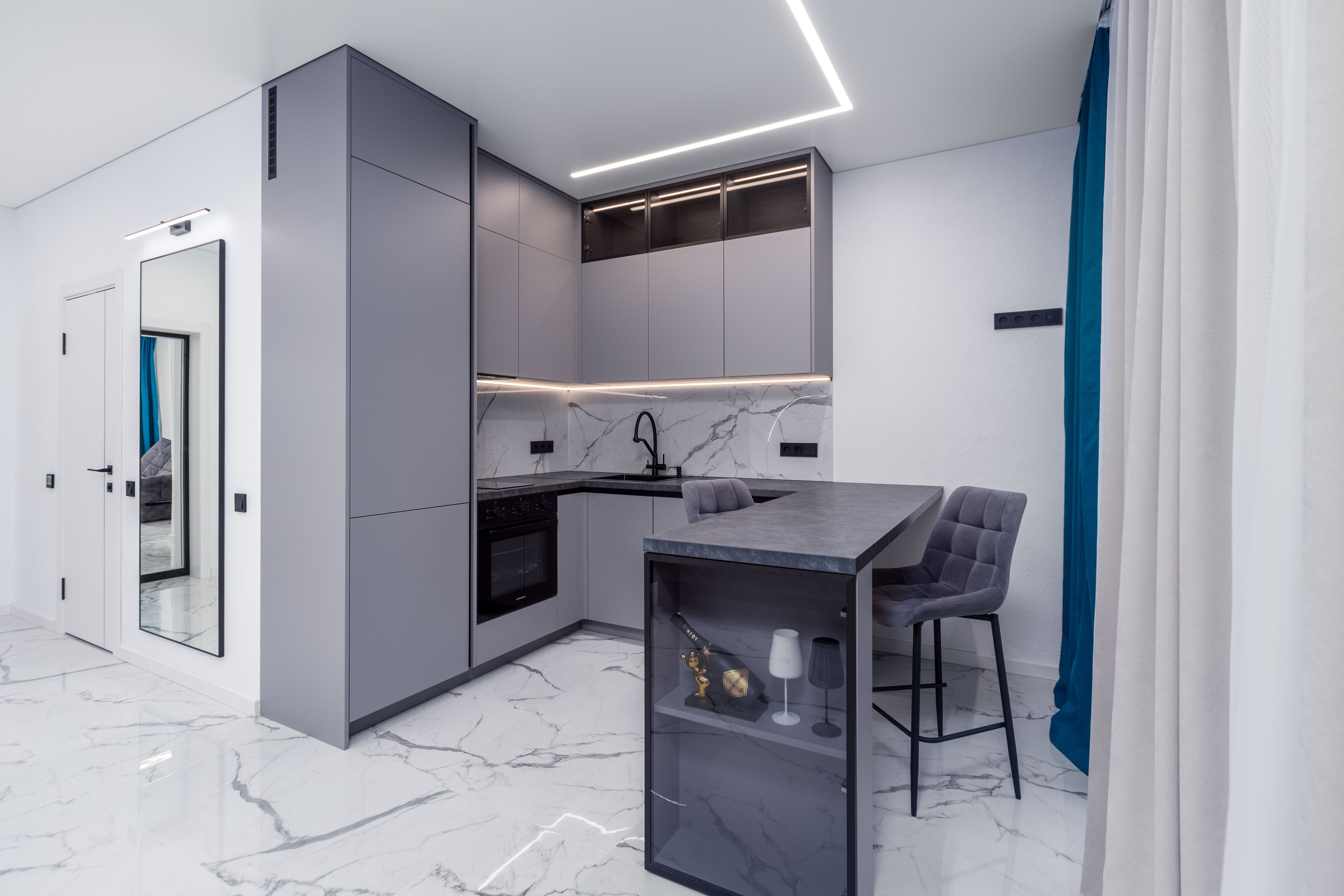 Зона кухни в квартире-студии в ЖК Новая Боровая