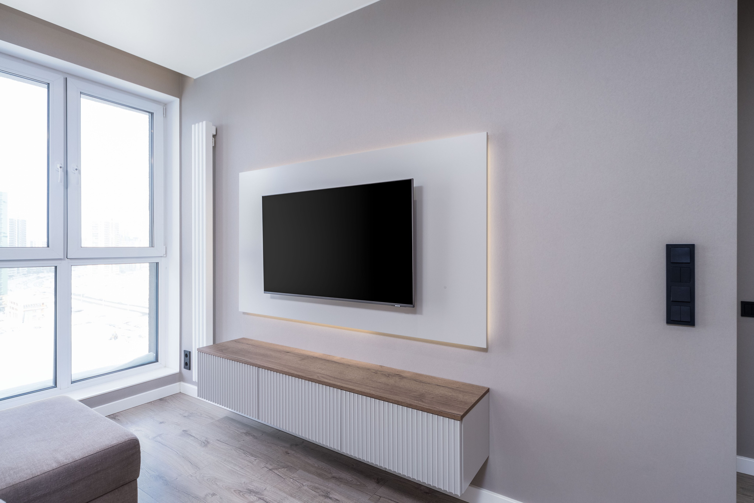 Интерьер кухни-гостиной в трехкомнатной квартире в ЖК Минск Мир