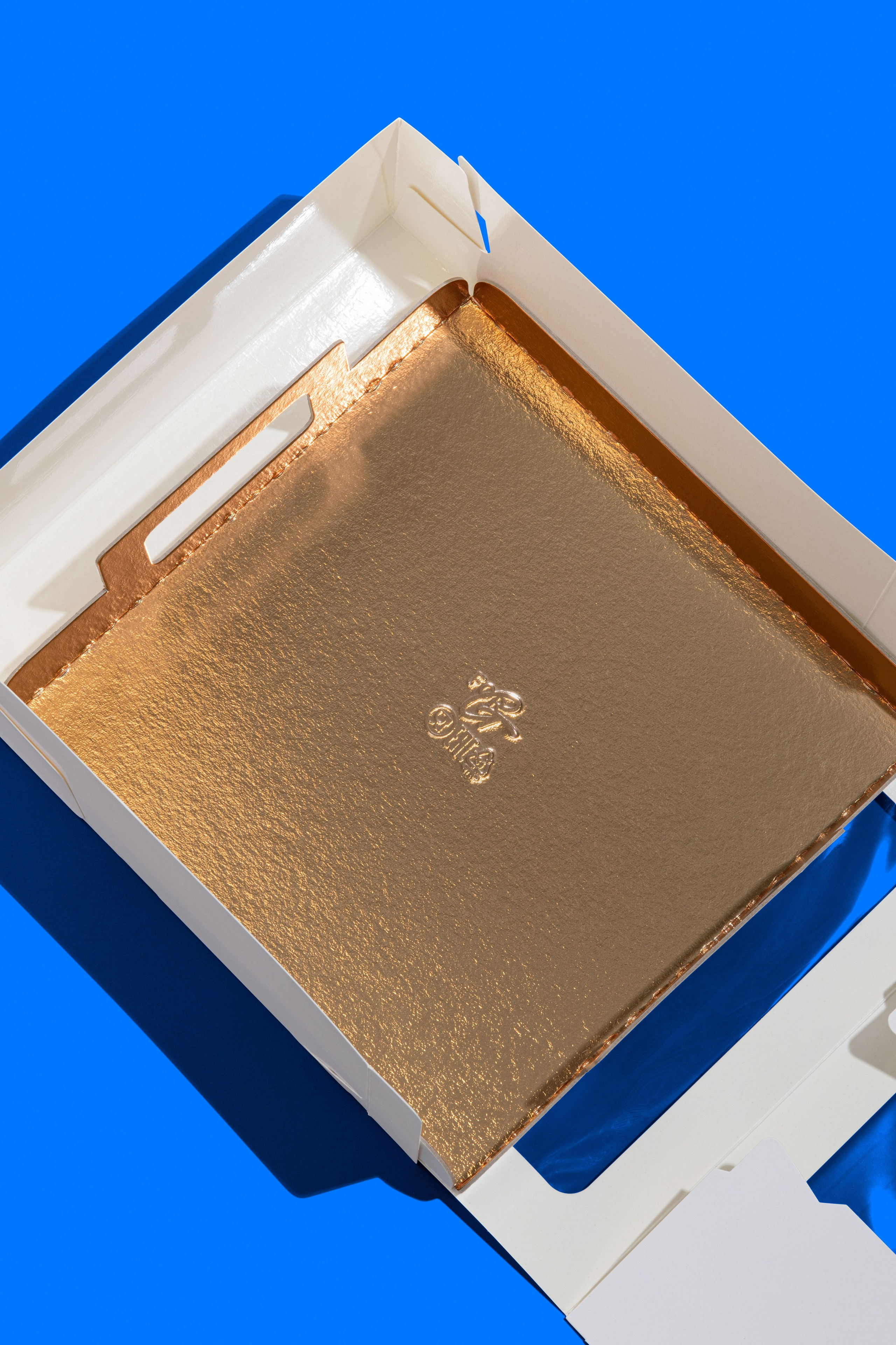 Кондитерская упаковка. Предметная фотосъемка. Предметный фотограф. Москва. Подложка для торта.