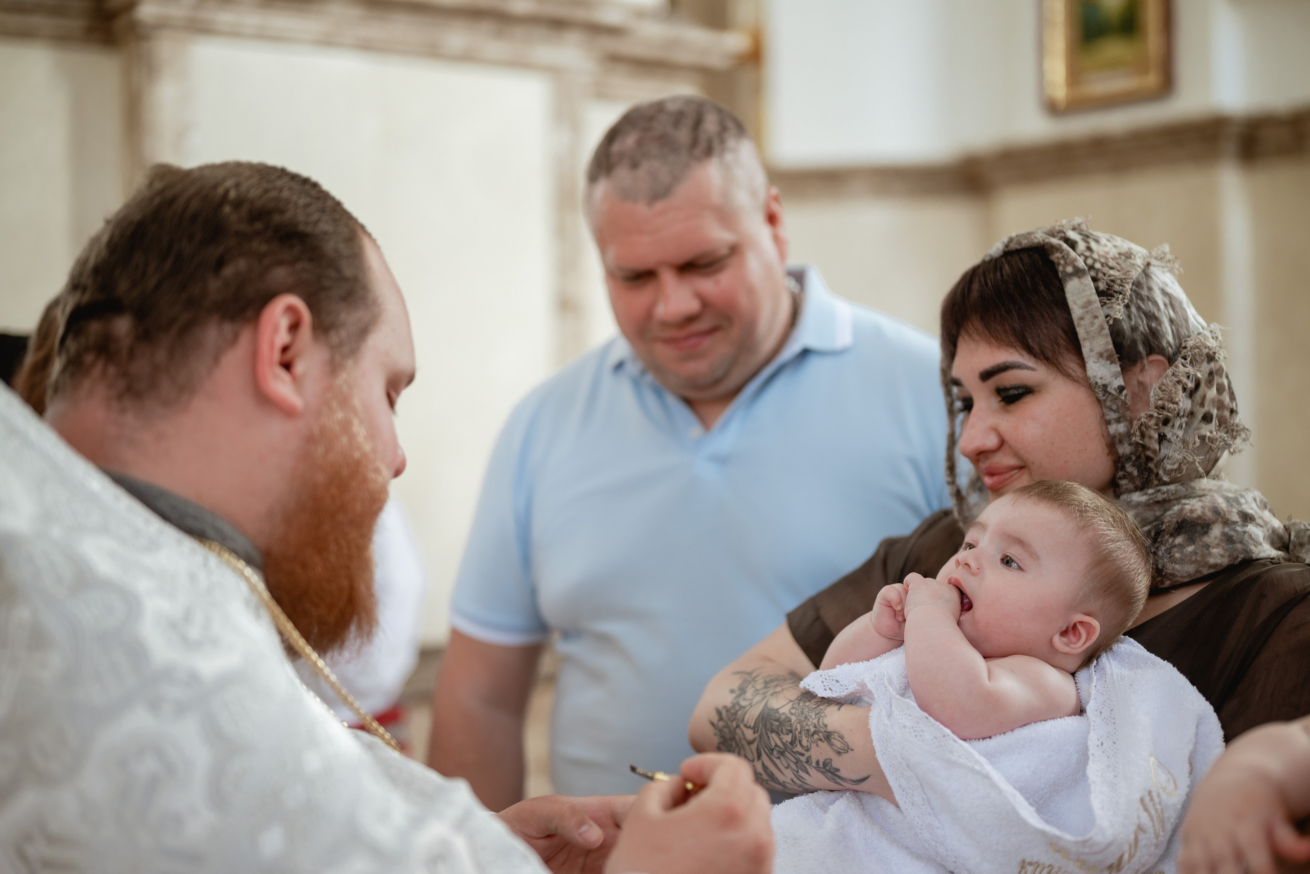 Крещение в храме Петра и Февронии. Юлия Басня семейный и свадебный фотограф в Донецке
