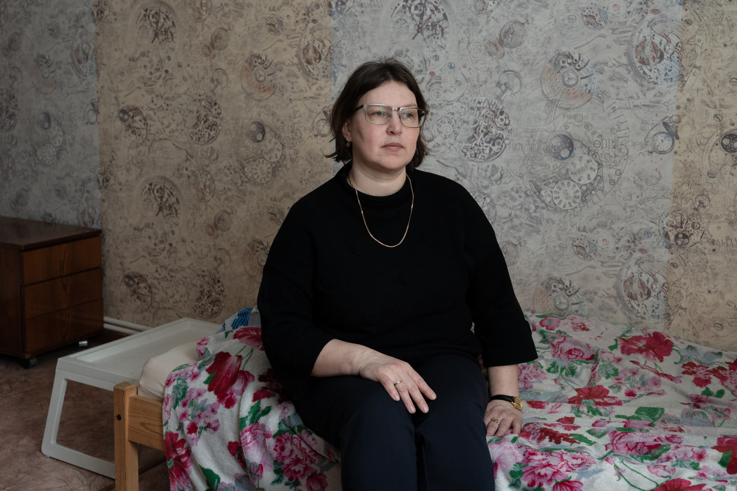Tatyana Skurikhina, the wife of Dmitry Skurikhin, who was sentenced to 3 years for discrediting the Russian army, in the room of her daughters in their house with Dmitry. Dmitry is an entrepreneur from the Leningrad region and a civil activist. He was a deputy of the village council, an election observer, and sought to repair roads and heating mains in his native village of Russian-Vysotskoye, Leningrad region. He opened his own grocery store in the same village. Two criminal cases were opened against Skurikhin for discrediting the army. The first criminal case was opened in September 2022. The reason was an anti-war poster posted on his store. The second case was opened on the first anniversary of the Russian invasion of Ukraine. Dmitry went out to his store with a poster "Sorry, Ukraine" and knelt down. In August 2023, Dmitry was sentenced to 1.5 years in a penal colony, despite the presence of minor children.