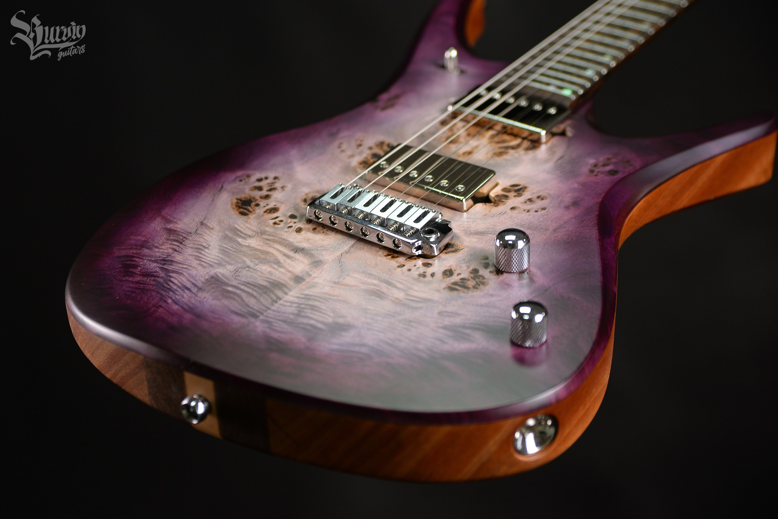 054 AXES. Master of making guitars and basses to order