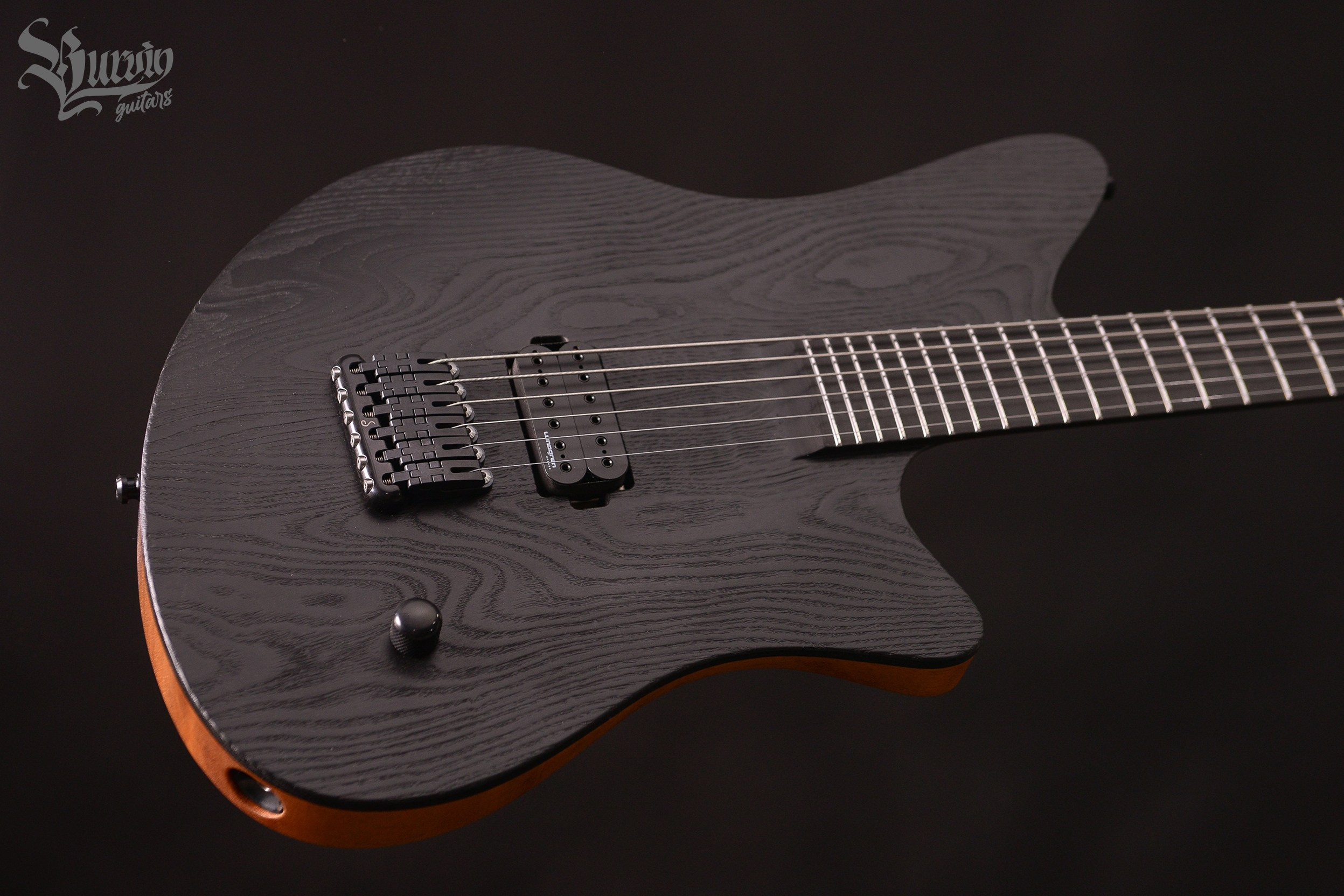 033 YAGA. Master of making guitars and basses to order