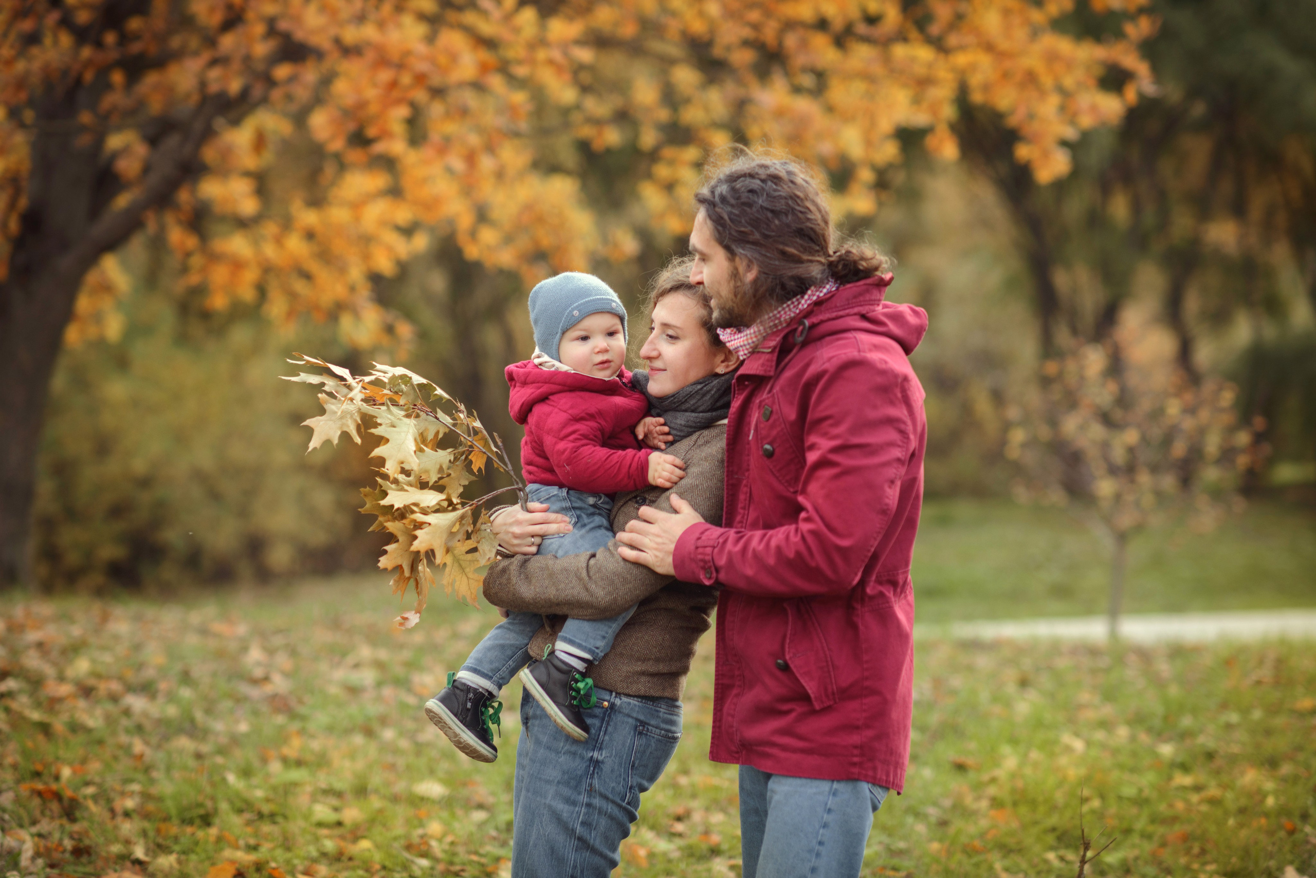 Family photo shoot in autumn. Photos with yellow leaves