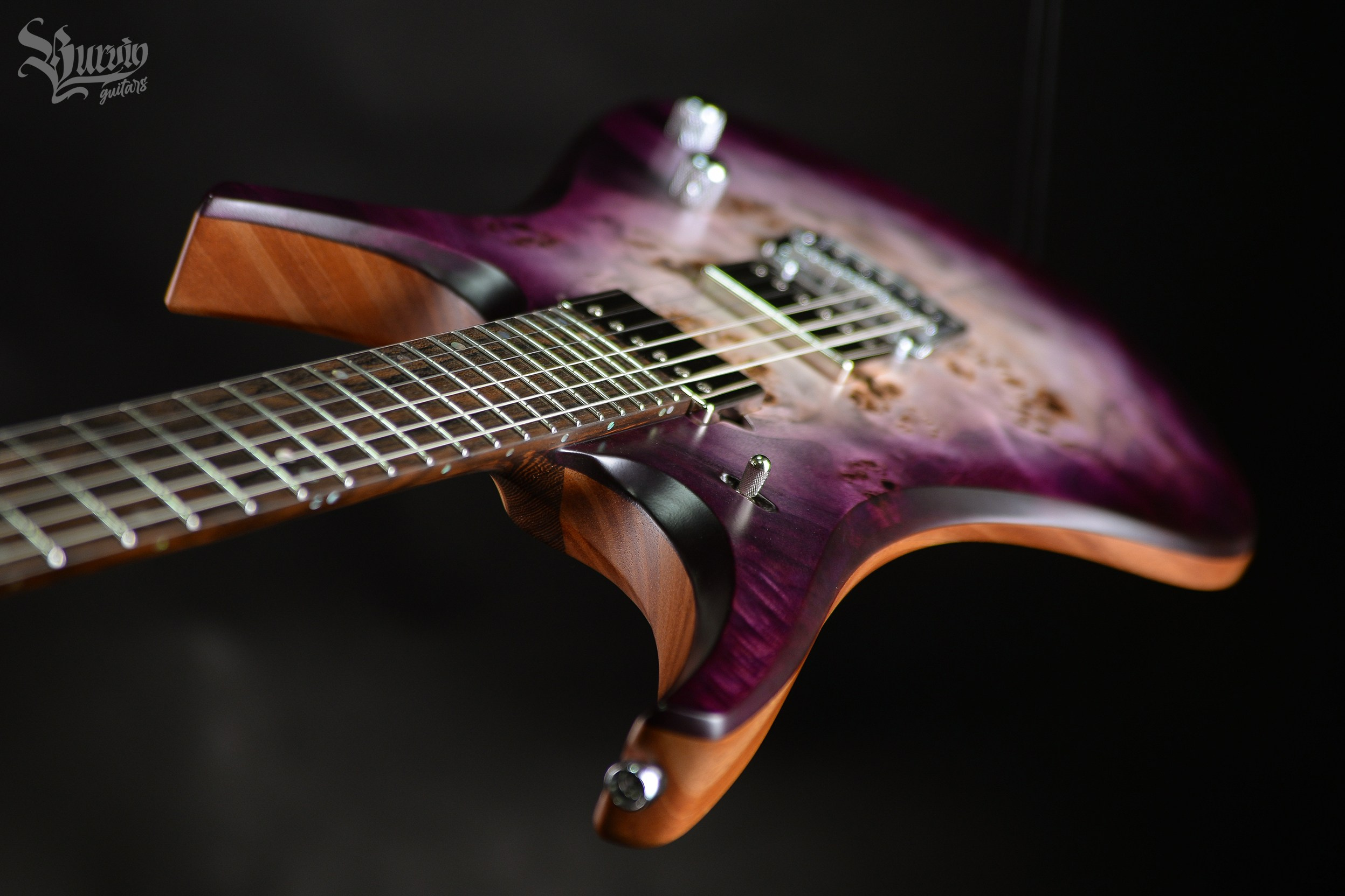 054 AXES. Master of making guitars and basses to order