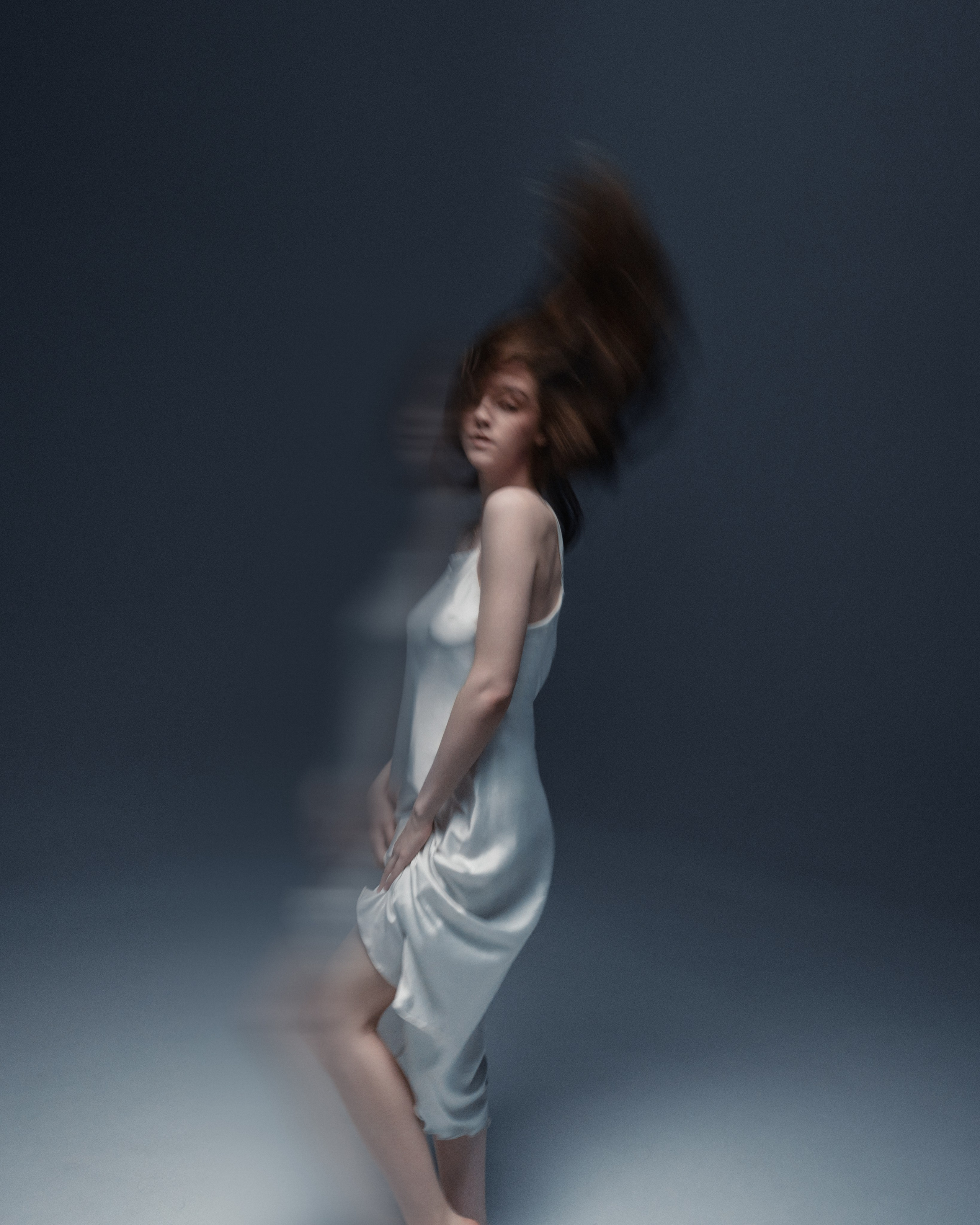 Women’s portrait photoshoot in a professional studio with natural lighting