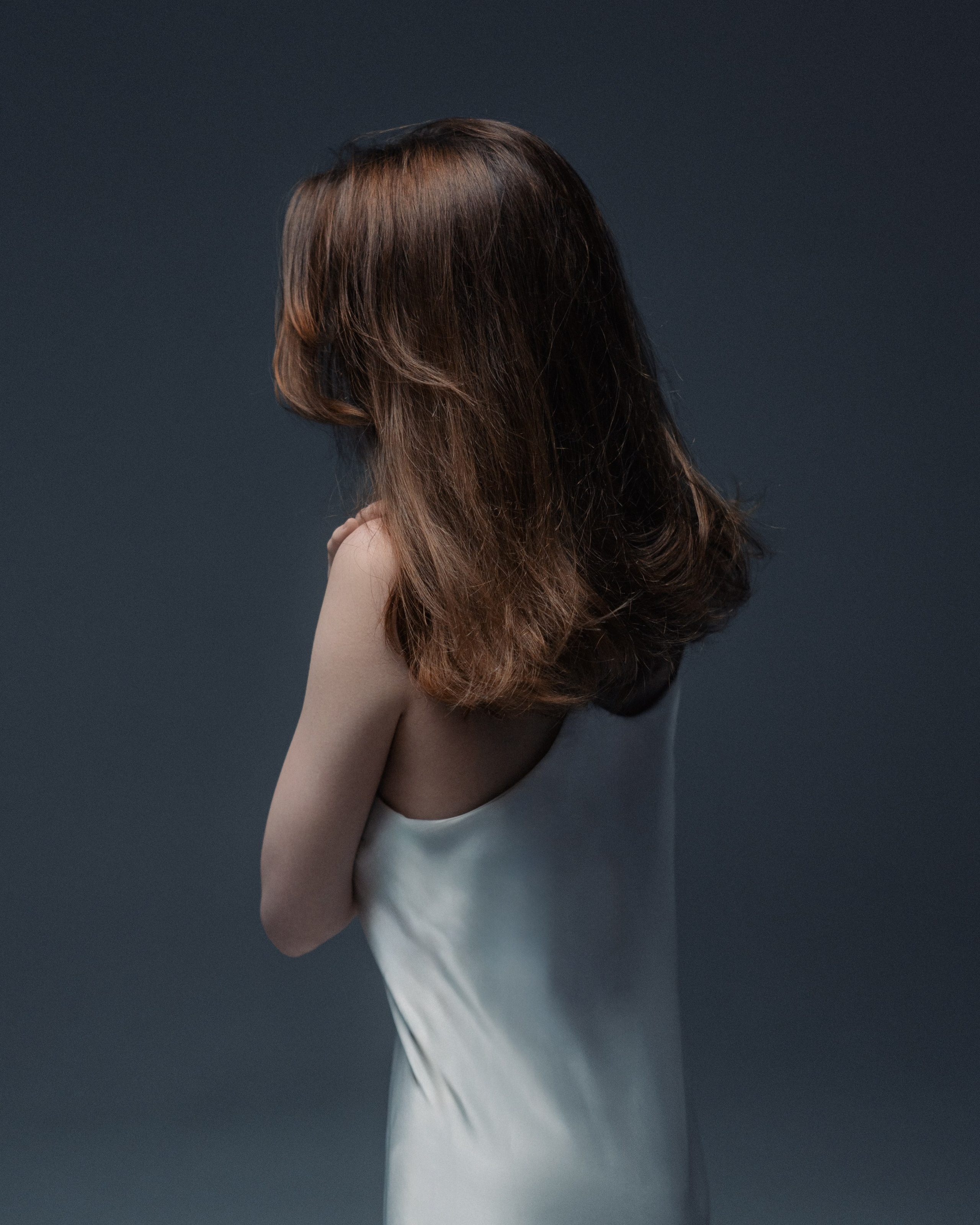 Women’s portrait photoshoot in a professional studio with natural lighting