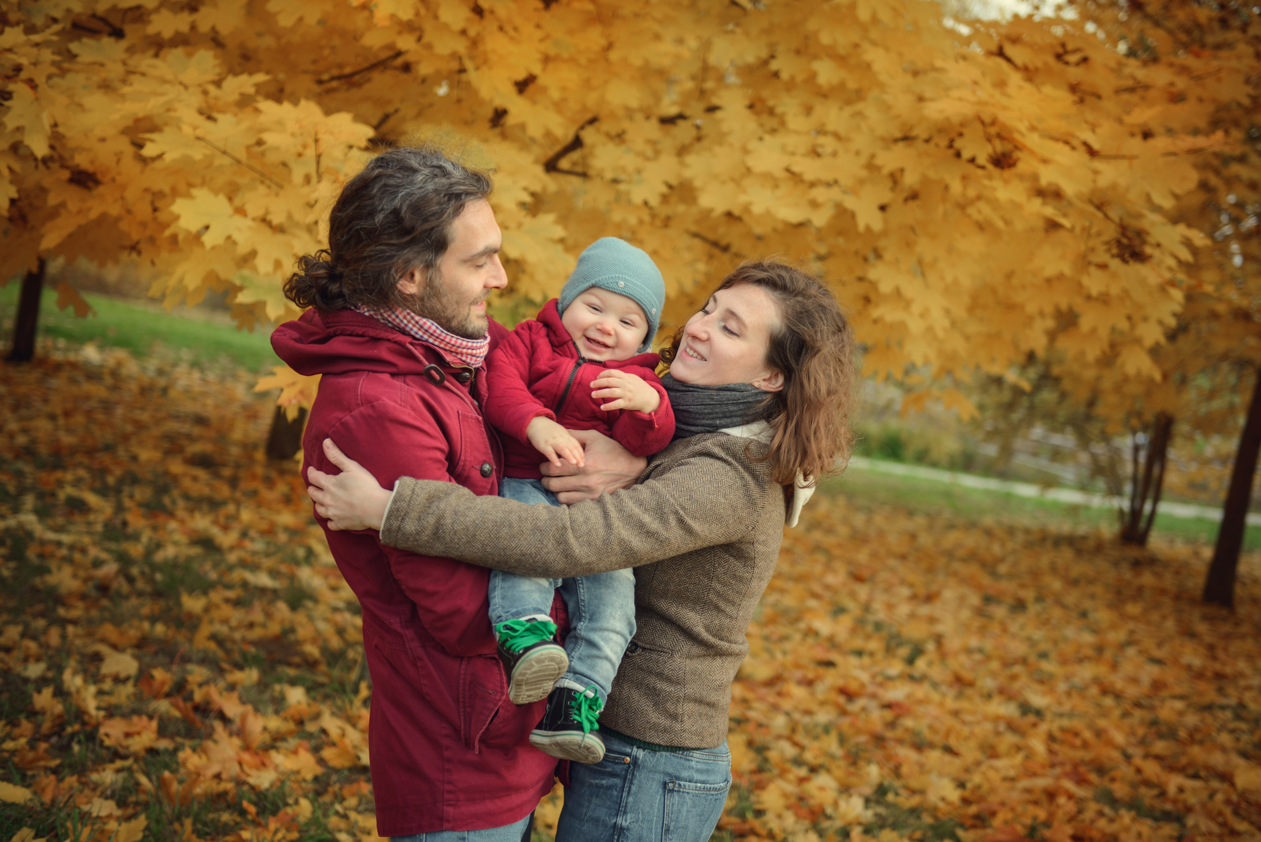 Family photo shoot in autumn. Photos with yellow leaves